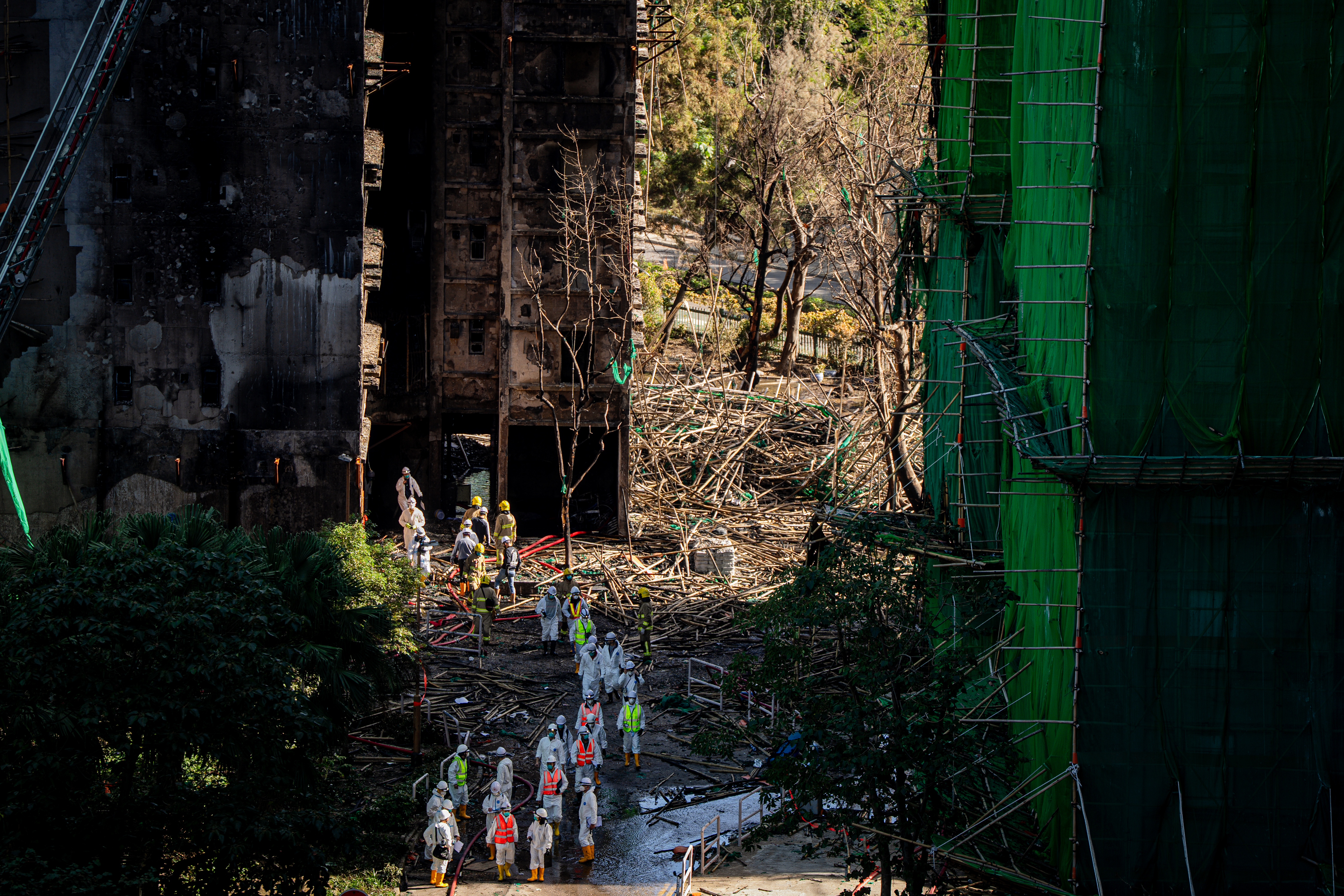 Hong Kong arrests more suspects in fire probe as death toll hits 151
