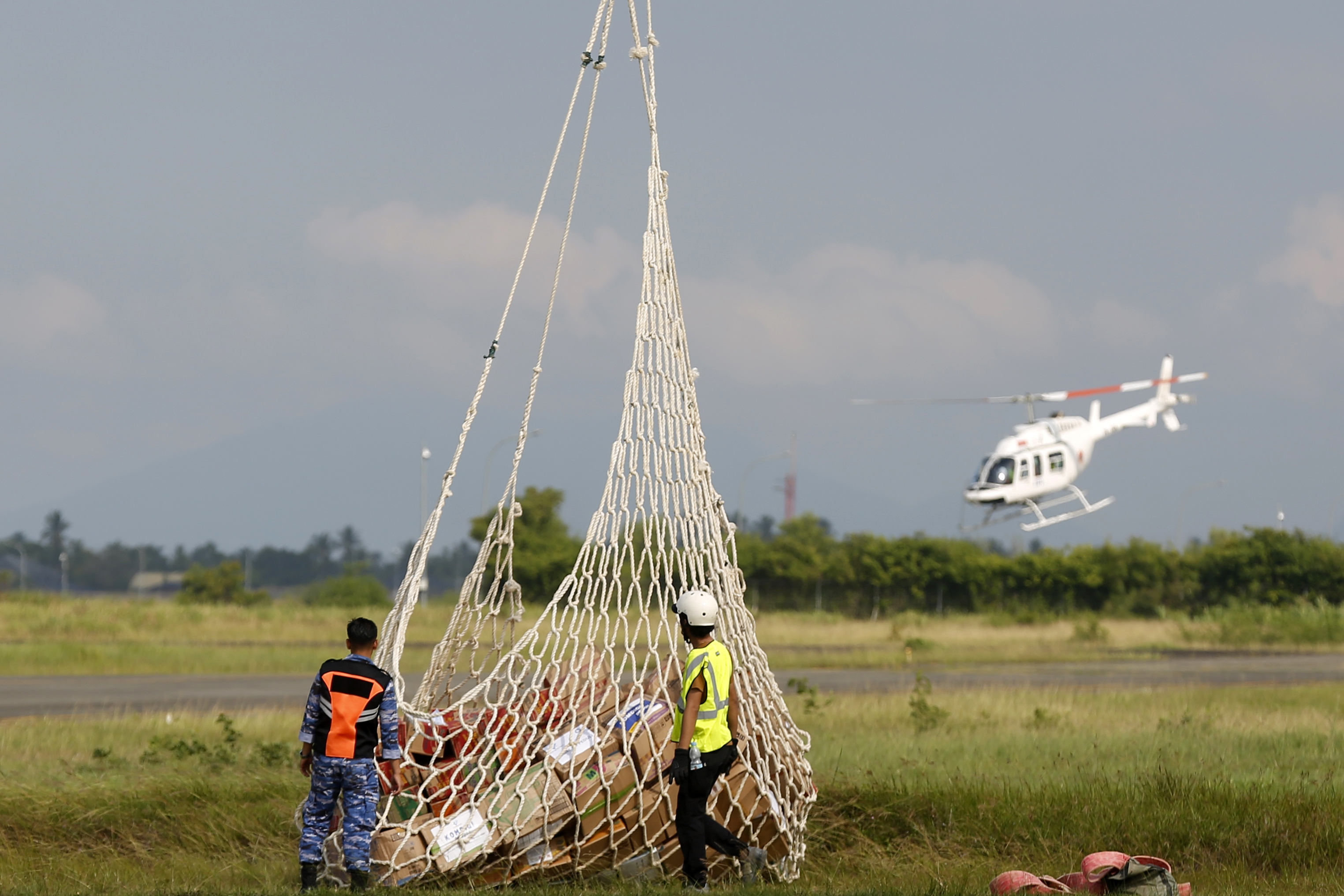 Indonesian military steps up relief efforts for flood-hit Sumatra; death toll above 860

