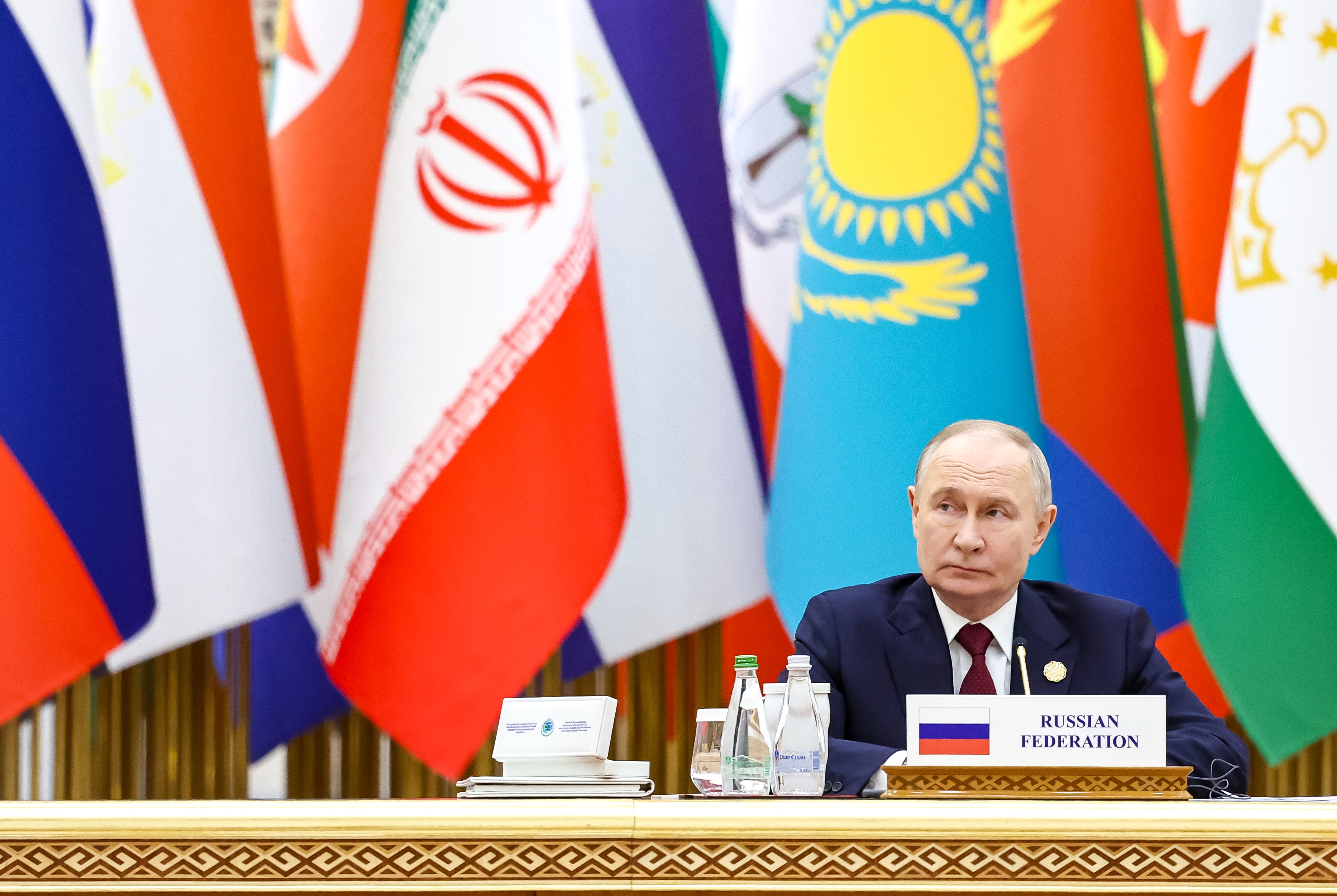 Russian President Vladimir Putin attends a plenary session of the International Forum dedicated to the International Year of Peace and Trust, the International Day of Neutrality, and the 30th anniversary of Turkmenistan's neutrality status, at the Congress Centre in Ashgabat, Turkmenistan, 12 December 2025.  EPA/ALEXANDER KAZAKOV / SPUTNIK / KREMLIN POOL MANDATORY CREDIT