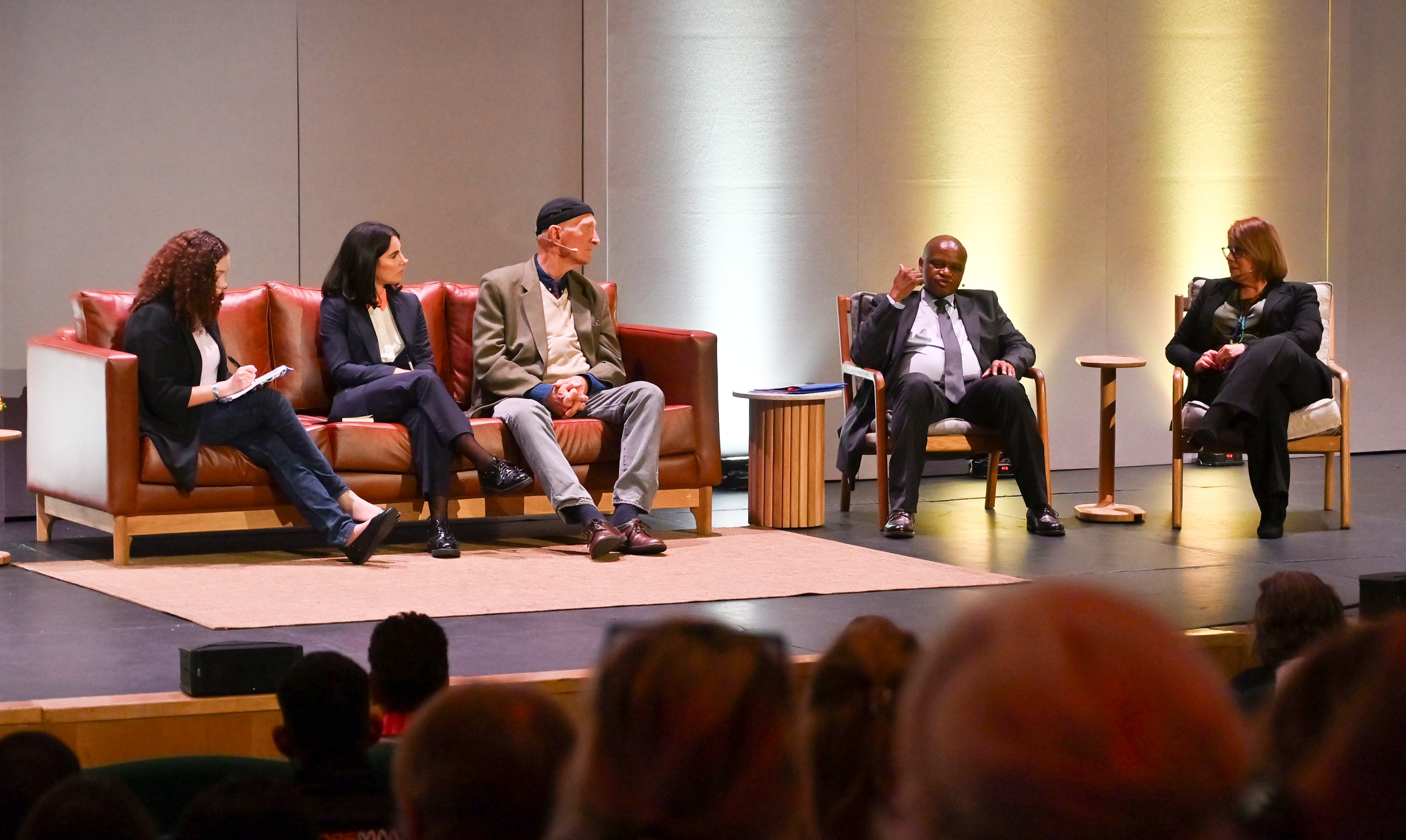 Caryn Dolley moderates a panel with Rebecca Gore, Judge Edwin Cameron, Andy Mothibi and Lizette Lancaster at The Gathering 2026