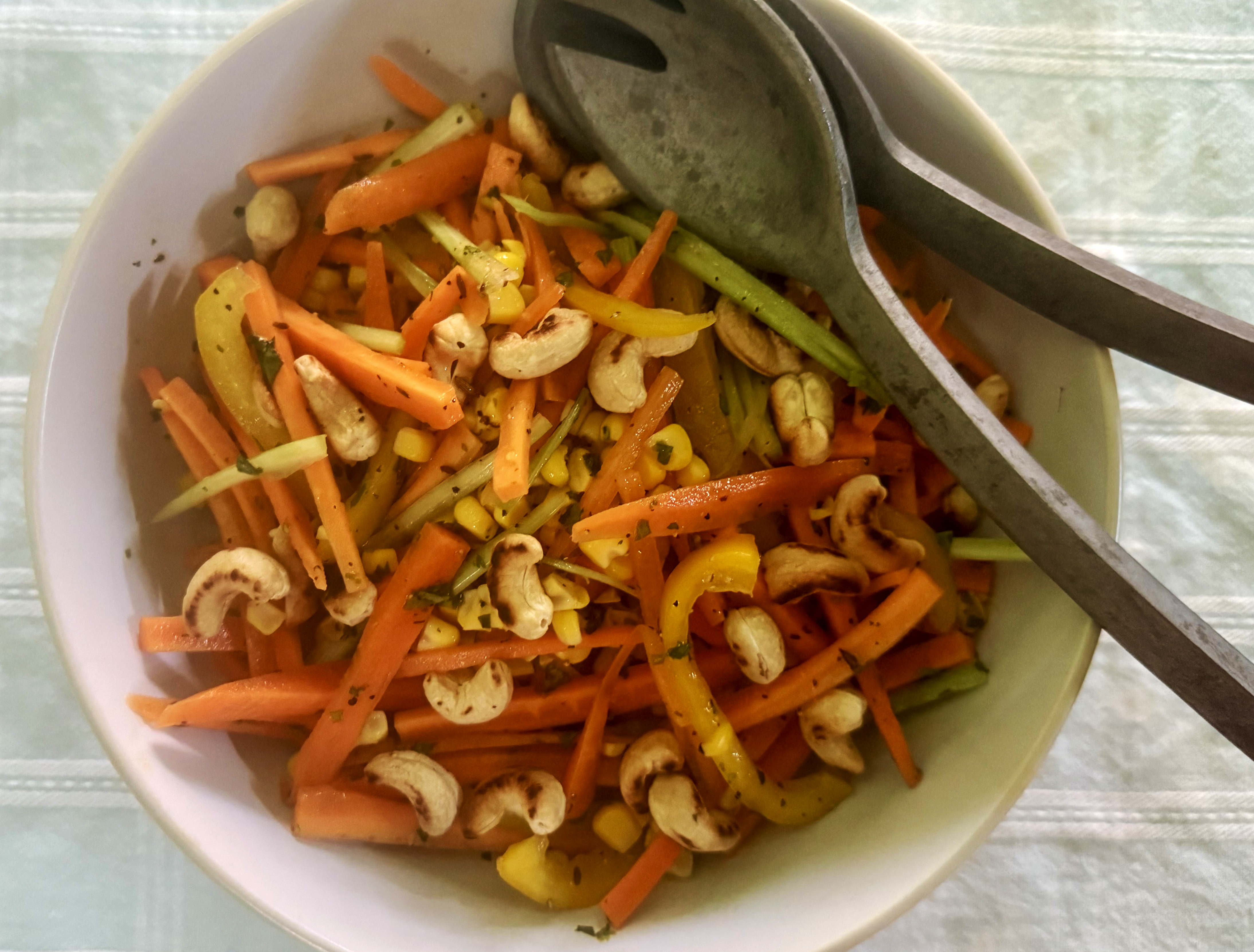 Salad Days: Carrot, celery, sweetcorn and cashew salad with toasted cumin dressing