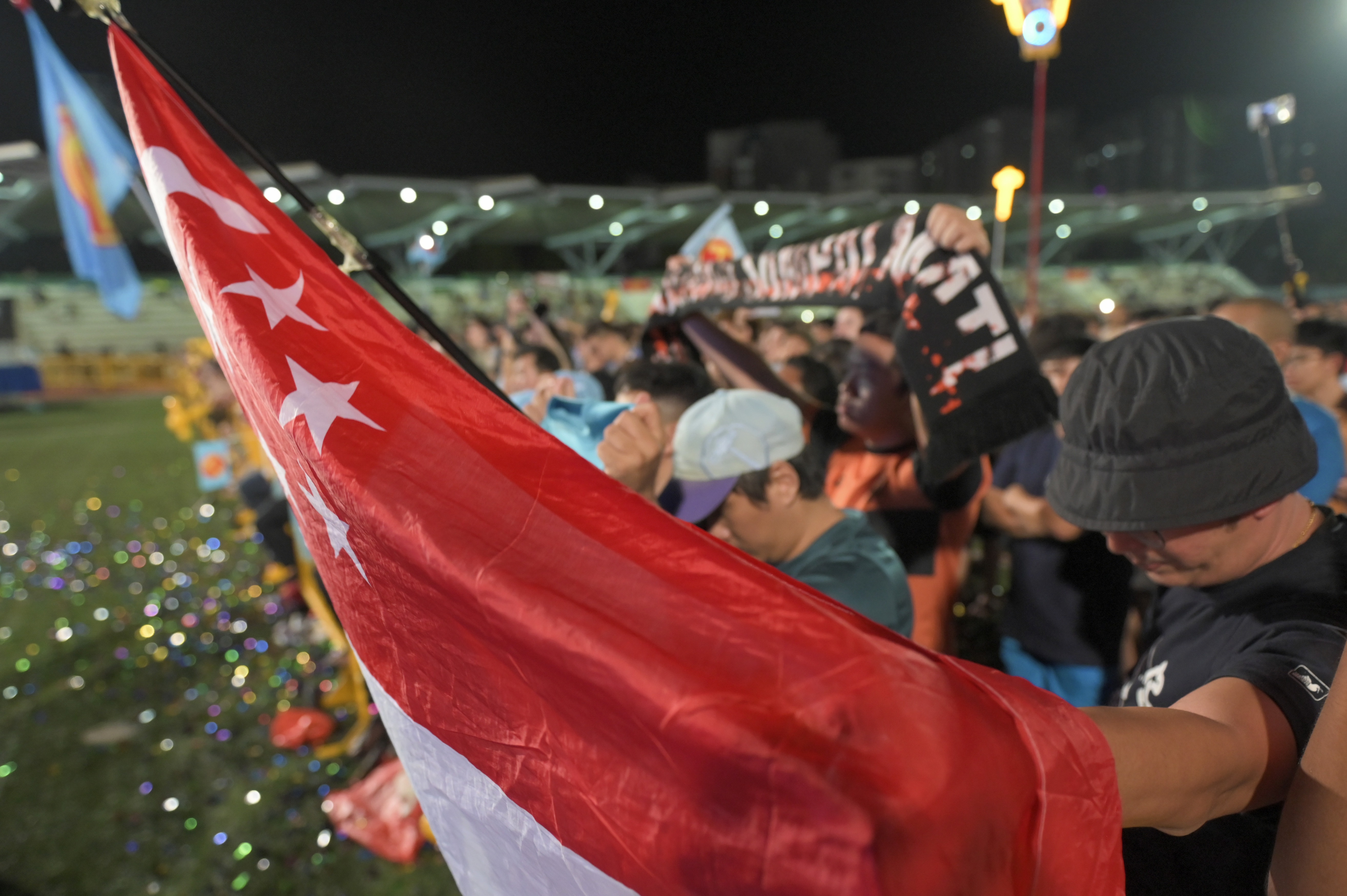 Supporters of the Leader of the opposition and secretary-general of the Workers' Party, Pritam Singh, react as he delivers his speech after the preliminary results of the general elections were announced in Singapore, 04 May 2025. Singaporeans go to the polls to elect 97 members of Parliament across 33 constituencies, five of which have already been secured by the ruling People's Action Party (PAP) through a walkover.  EPA/SIMON LIM