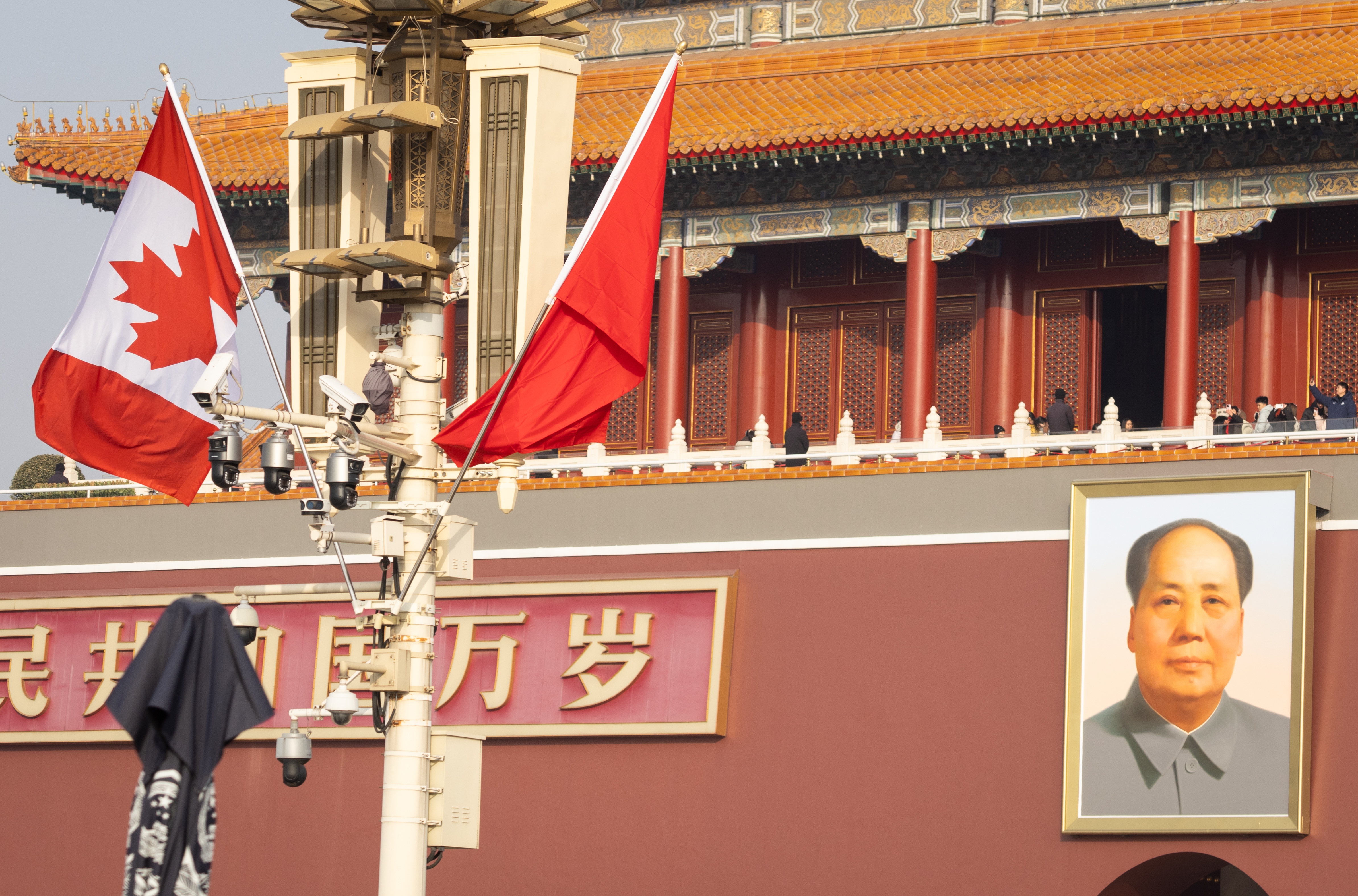 The Canadian flag is displayed alongside the Chinese flag at Tiananmen Square in Beijing, China, 15 January 2026. Canadian Prime Minister Mark Carney is visiting Beijing from 14 to 17 January and will meet with Chinese President Xi Jinping on 16 January.  EPA/JESSICA LEE