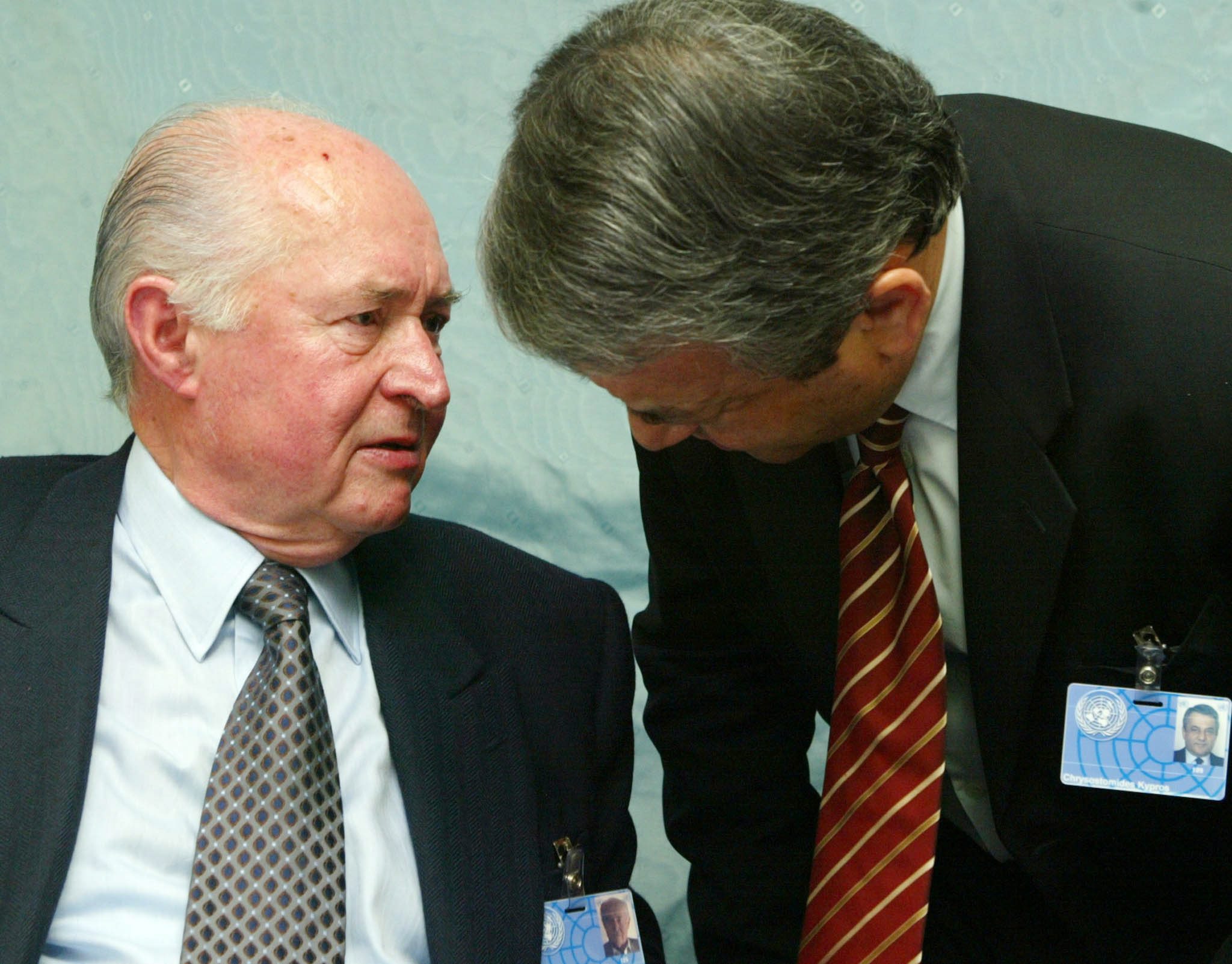 Vassiliou George (L) United Democrats President talks to Greek Cypriot Government spokesman Kypros Chrysostomides (R) during a press conference at the Buergenstock near Lucerne, Switzerland, Tuesday 30 March 2004. United Nations Secretary General Kofi Annan presented a revised reunification plan to Greek and Turkish Cypriot leaders at a meeting in Switzerland yesterday. Both sides have until Tuesday to approve the 9,000 page plan which includes about 131 draft bill proposals, before it goes to a referendum in three weeks. Referendums have been scheduled for April 20 and 25.  EPA/Katia Christodoulou