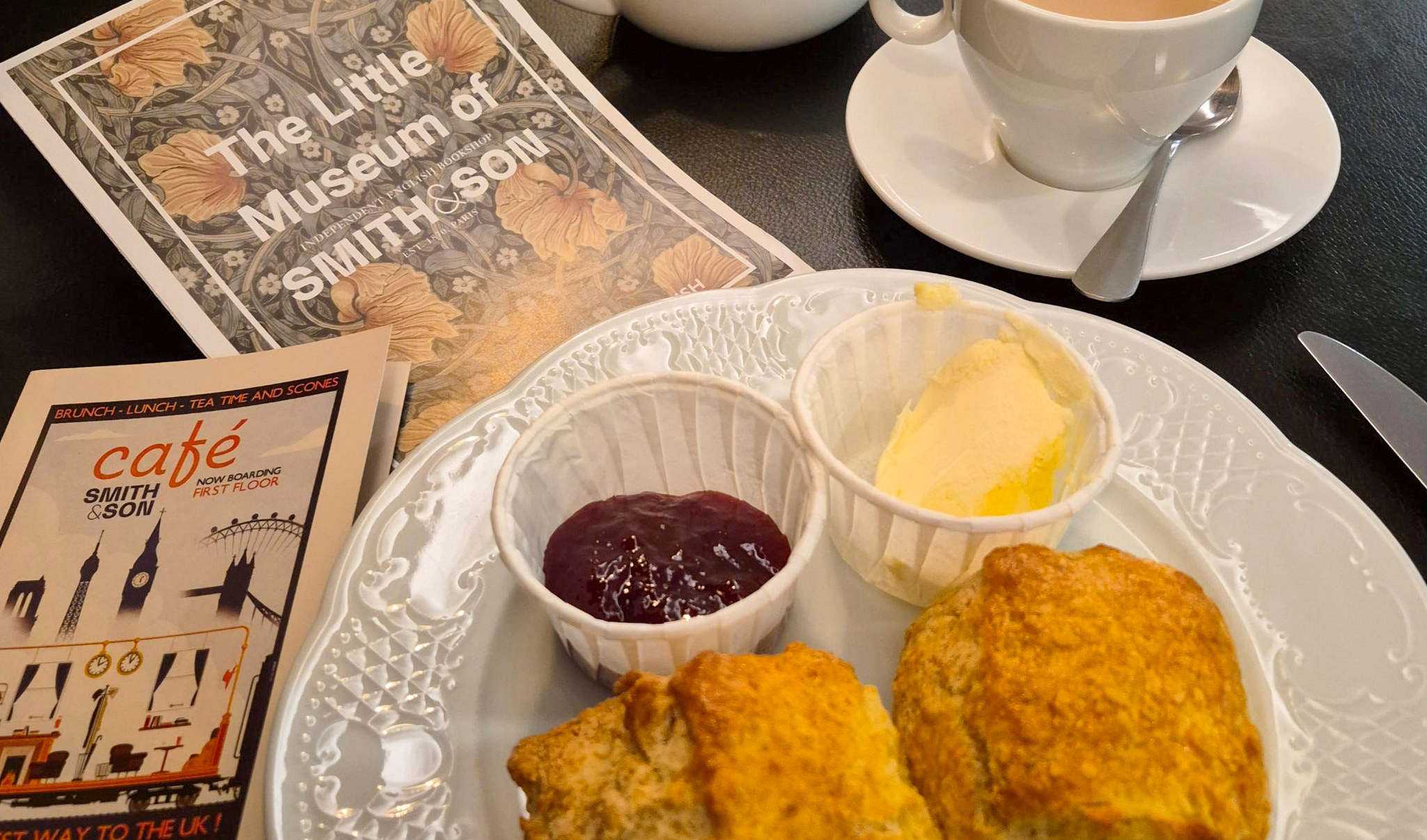 Scones, strawberry-violet jam and clotted cream at Smith & Son in Paris. Books and food — perfect. (Photo: Marita van der Vyver)