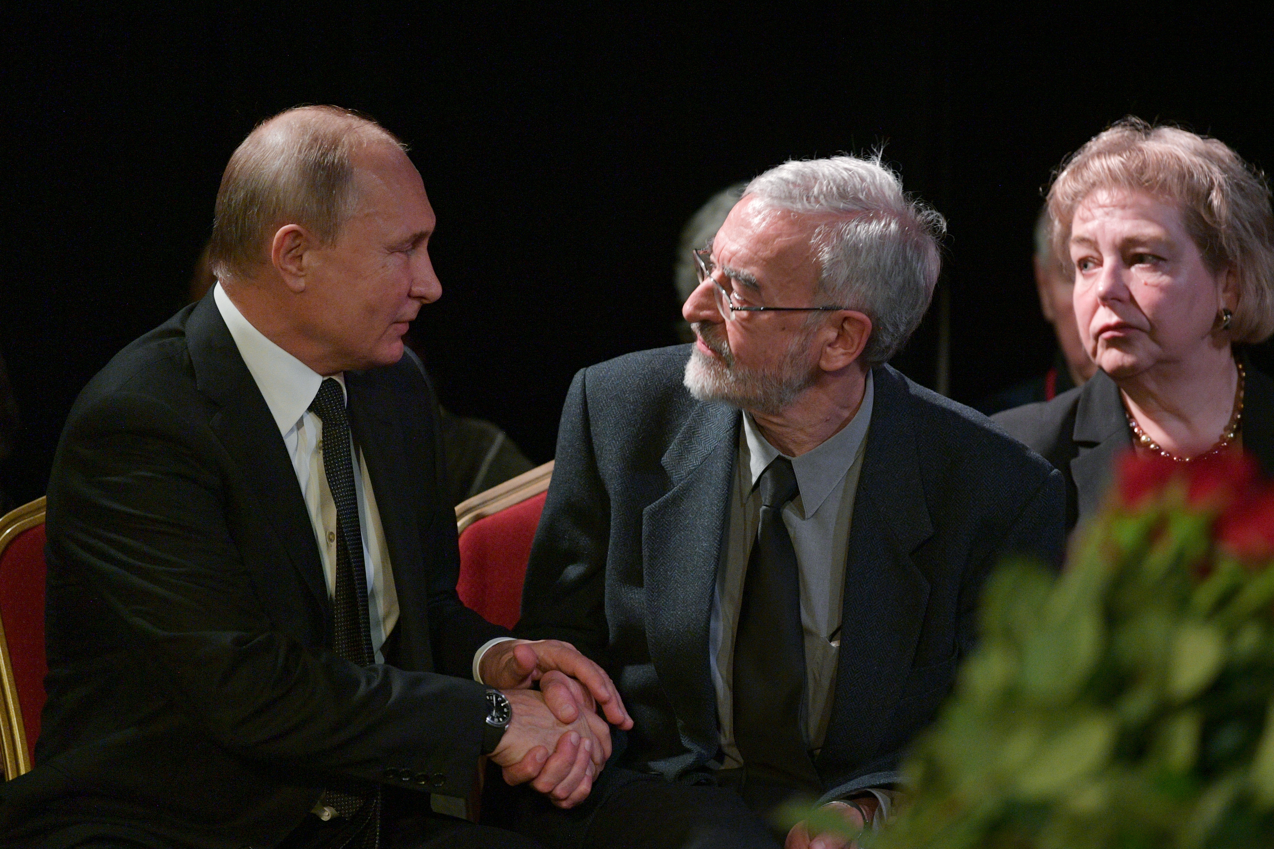 Russian President Vladimir Putin (L) and Lyudmila Alekseyeva's son, Professor of Economics at Indiana University, Michael Alexeyev (alternative spelling Alexeev) (C) attend a memorial ceremony for Russian human rights activist Lyudmila Alexeyeva at the Moscow Journalist House in Moscow, Russia, 11 December 2018. Russian human rights activist, head of Moscow Helsinki Group and Soviet-era dissident Lyudmila Alexeyeva died at a Moscow's hospital on 08 December 2018 at the age of 91.  EPA/ALEXEI DRUZHININ / SPUTNIK / KREMLIN POOL MANDATORY CREDIT