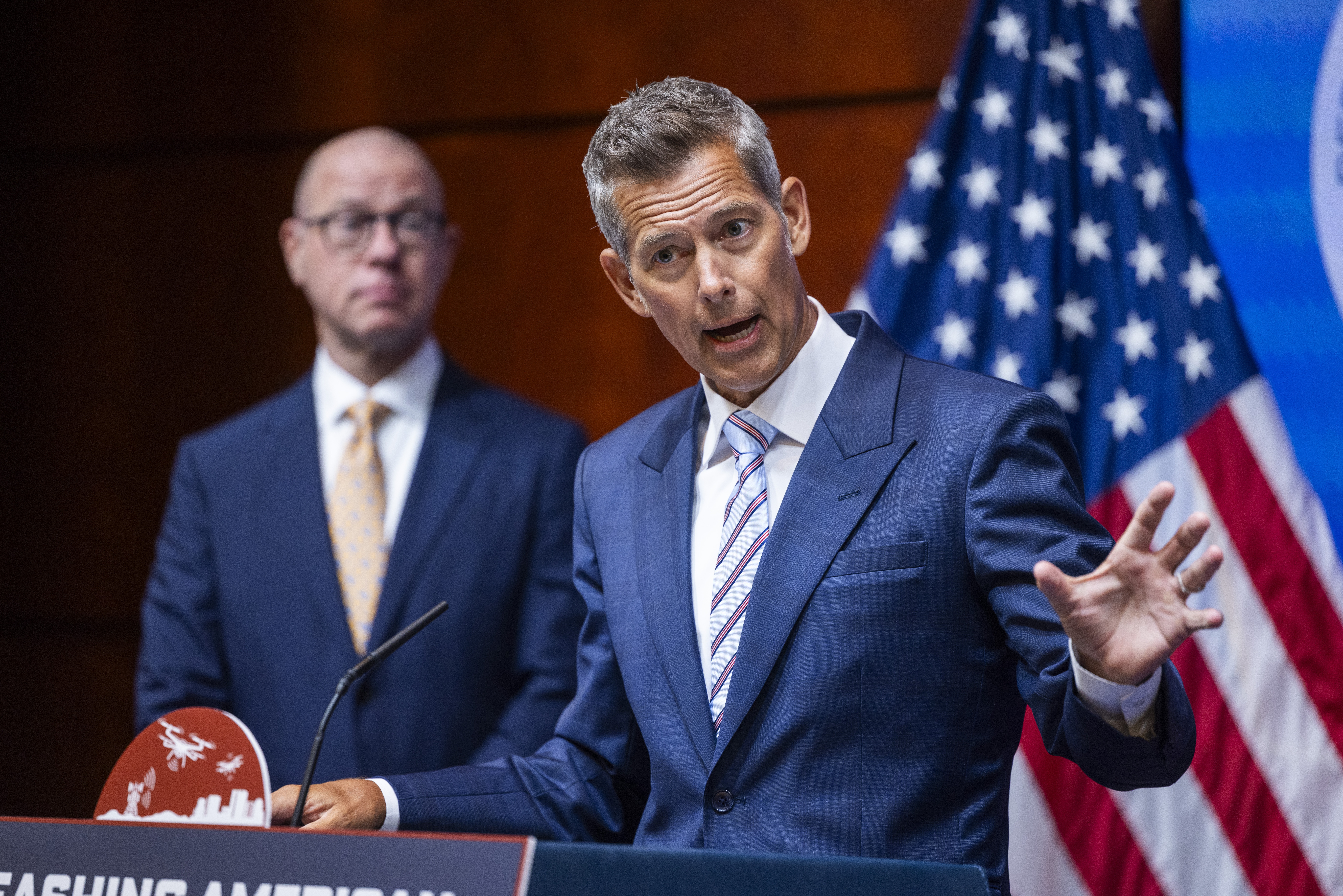 US Transportation Secretary Sean Duffy (R) speaks next to Federal Aviation Administration (FAA) Administrator Bryan Bedford during a press conference to promote American drone production at the Department of Transportation in Washington, DC, USA, 05 August 2025. The agency displayed four American-made drones designed for commercial use.  EPA/JIM LO SCALZO