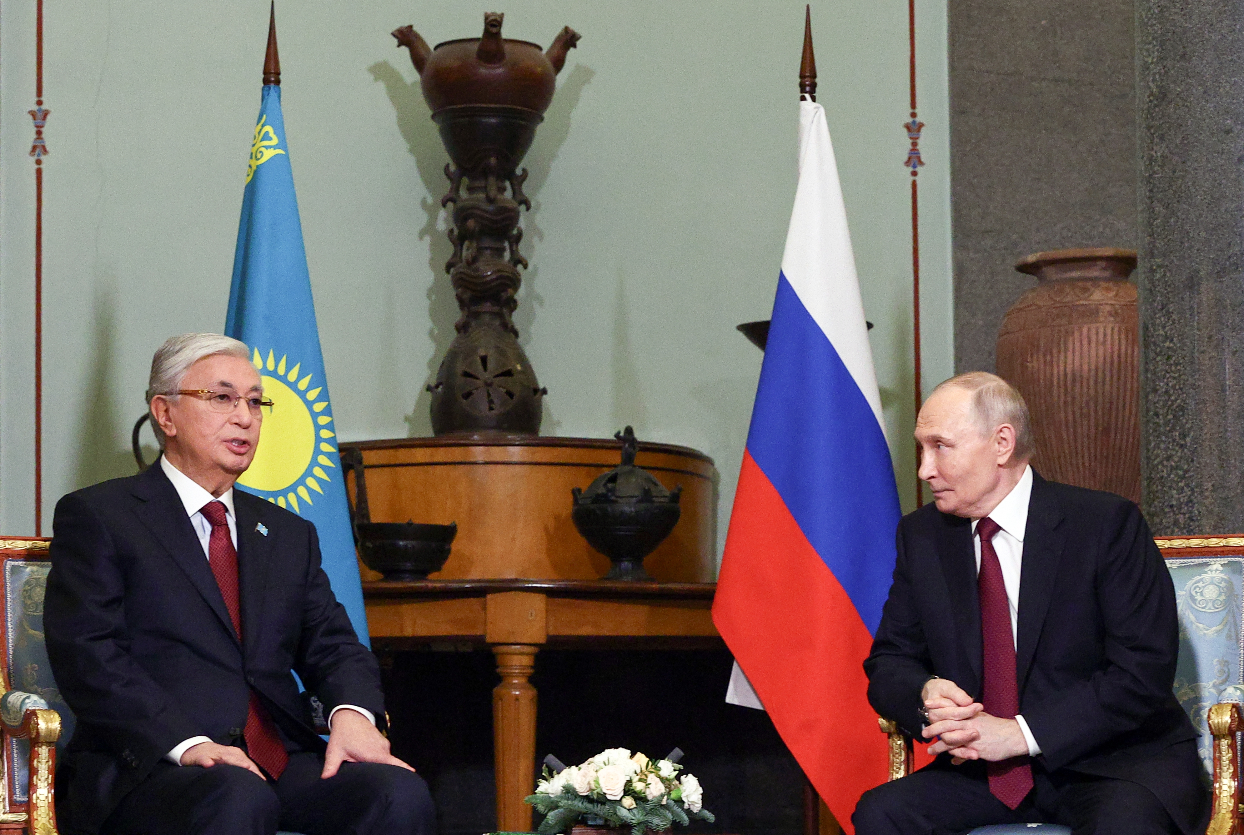 Kazakh President Kassym-Jomart Tokayev (L) and Russian President Vladimir Putin attend a meeting on the sidelines of an informal summit of the Commonwealth of Independent States (CIS) leaders at the State Hermitage Museum in St. Petersburg, Russia, 22 December 2025.  EPA/SERGEY BULKIN/SPUTNIK/KREMLIN / POOL MANDATORY CREDIT