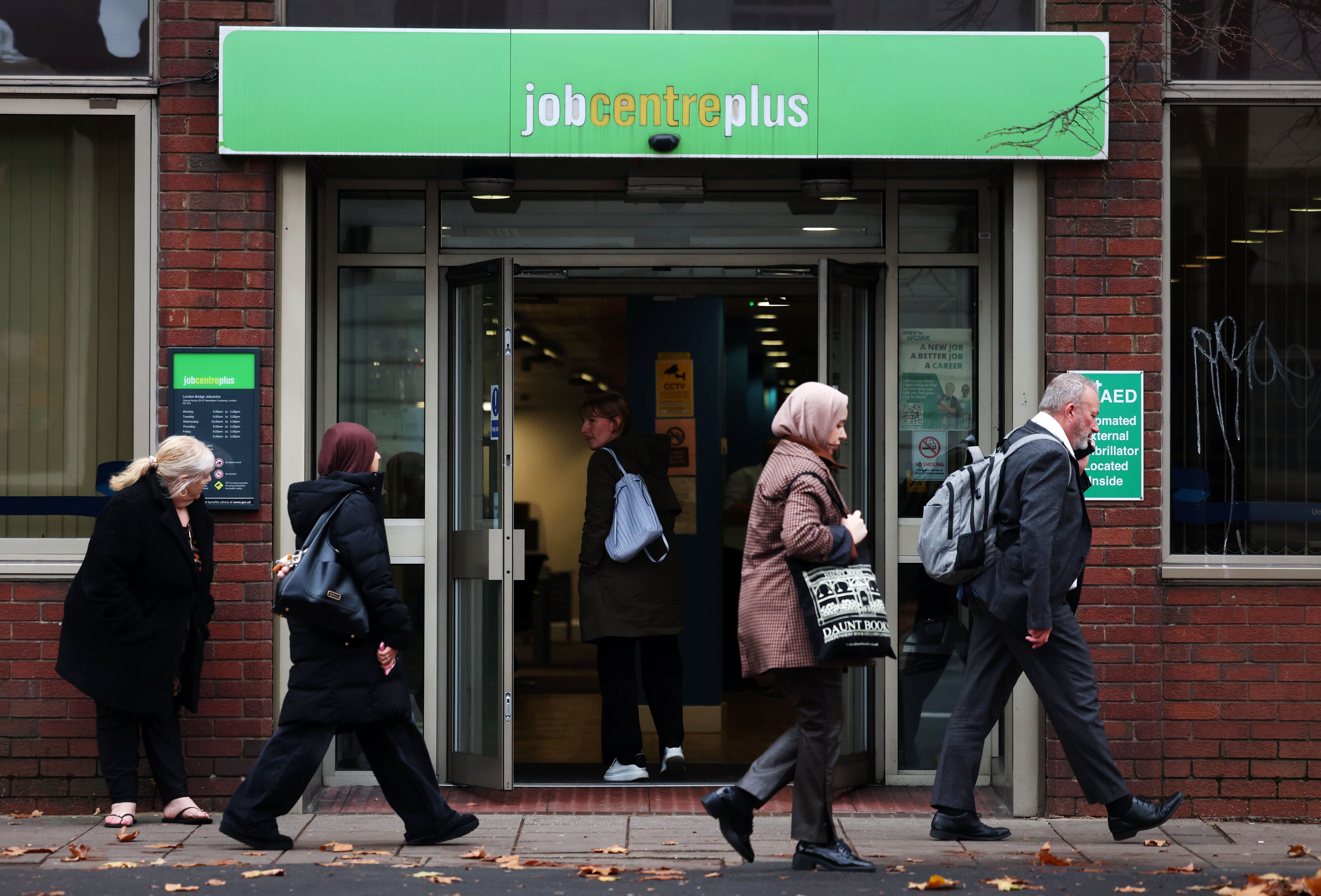 Pedestrians pass a job centre Plus in London, Britain, 11 November 2025. UK unemployment has risen to five percent in the third quarter of 2025, the highest it has been in four years.  EPA/ANDY RAIN