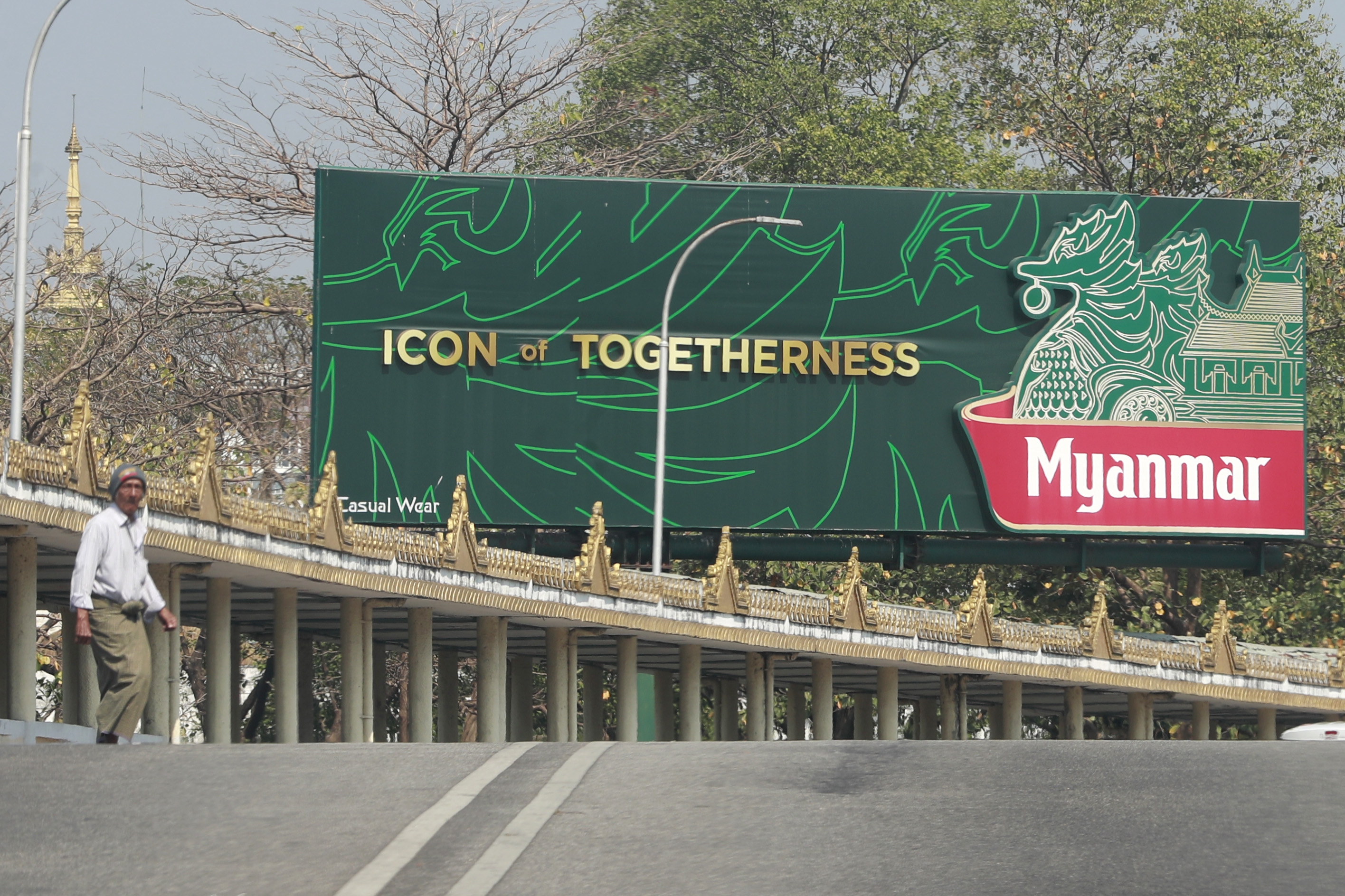 A man crosses a road on the fifth anniversary of the military takeover, in Yangon, Myanmar, 01 February 2026. On 01 February 2021, Myanmar's military seized power and declared a state of emergency, ousting the democratically elected government. The takeover sparked a nationwide civil disobedience movement and a protracted internal conflict.  EPA/NYEIN CHAN NAING