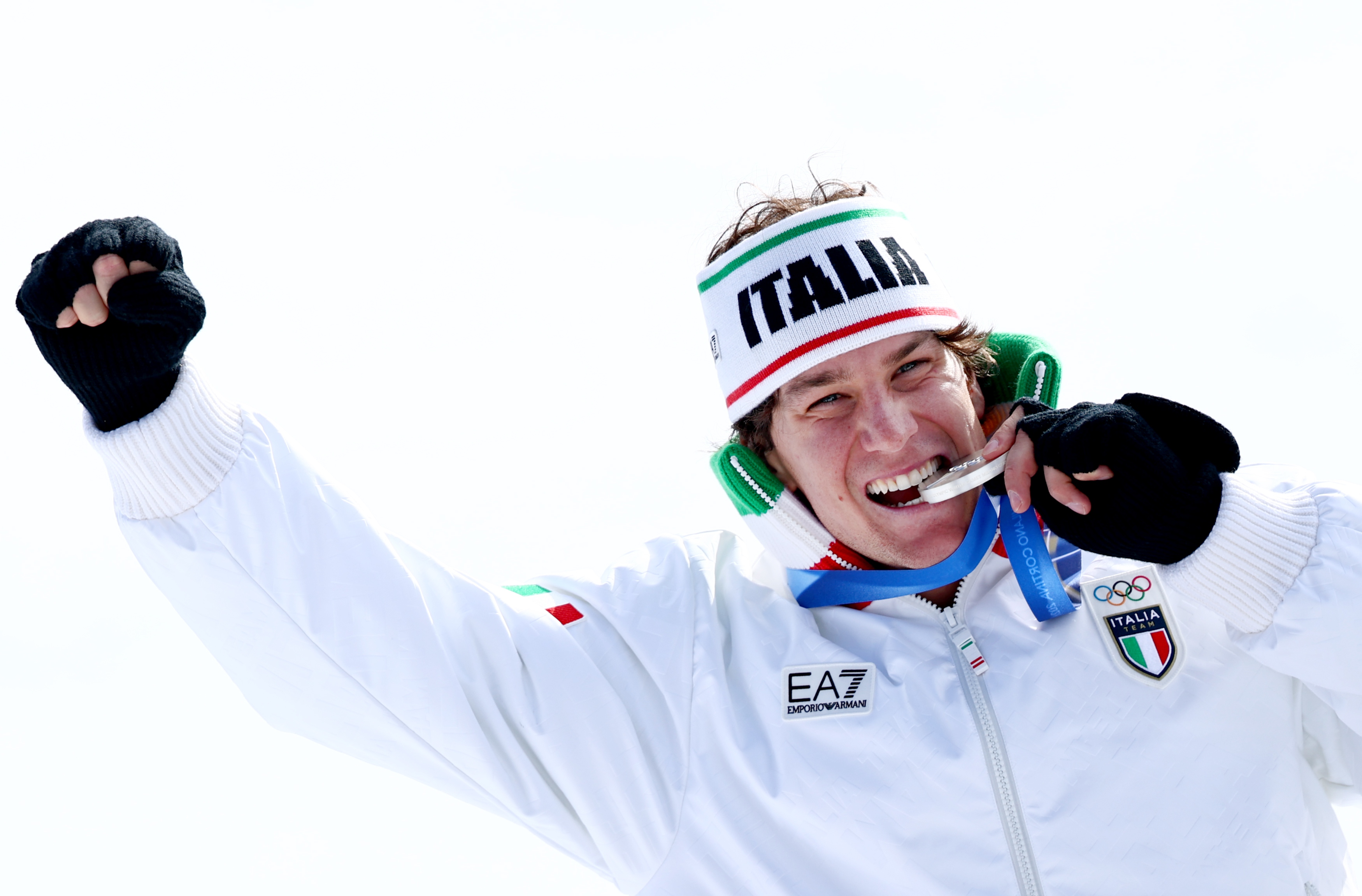 Silver medalist Giovanni Franzoni of Italy celebrates during the medal ceremony after the Men's Downhill of the Alpine Skiing competition, at the Milano Cortina 2026 Winter Olympic Games, Stelvio ski centre in Bormio, Italy, 07 February 2026.  EPA/ANNA SZILAGYI