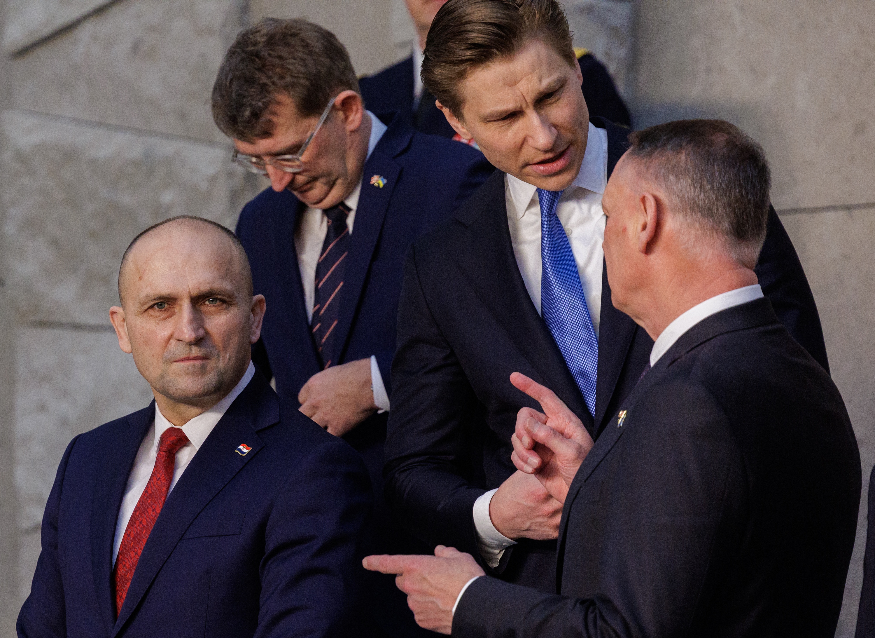 (L-R) Minister of Defense of Croatia Ivan Anusic, Minister of Defence of Denmark, Troels Lund Poulsen, Minister of Defense of Finland Antti Kakkanen and Minister of National Defence of Canada David McGuinty prepare to pose for a photo during the meeting of the NATO Ministers of Defence at the North Atlantic Treaty Organization (NATO) headquarters in Brussels, Belgium, 12 February 2026.  EPA/OLIVIER MATTHYS