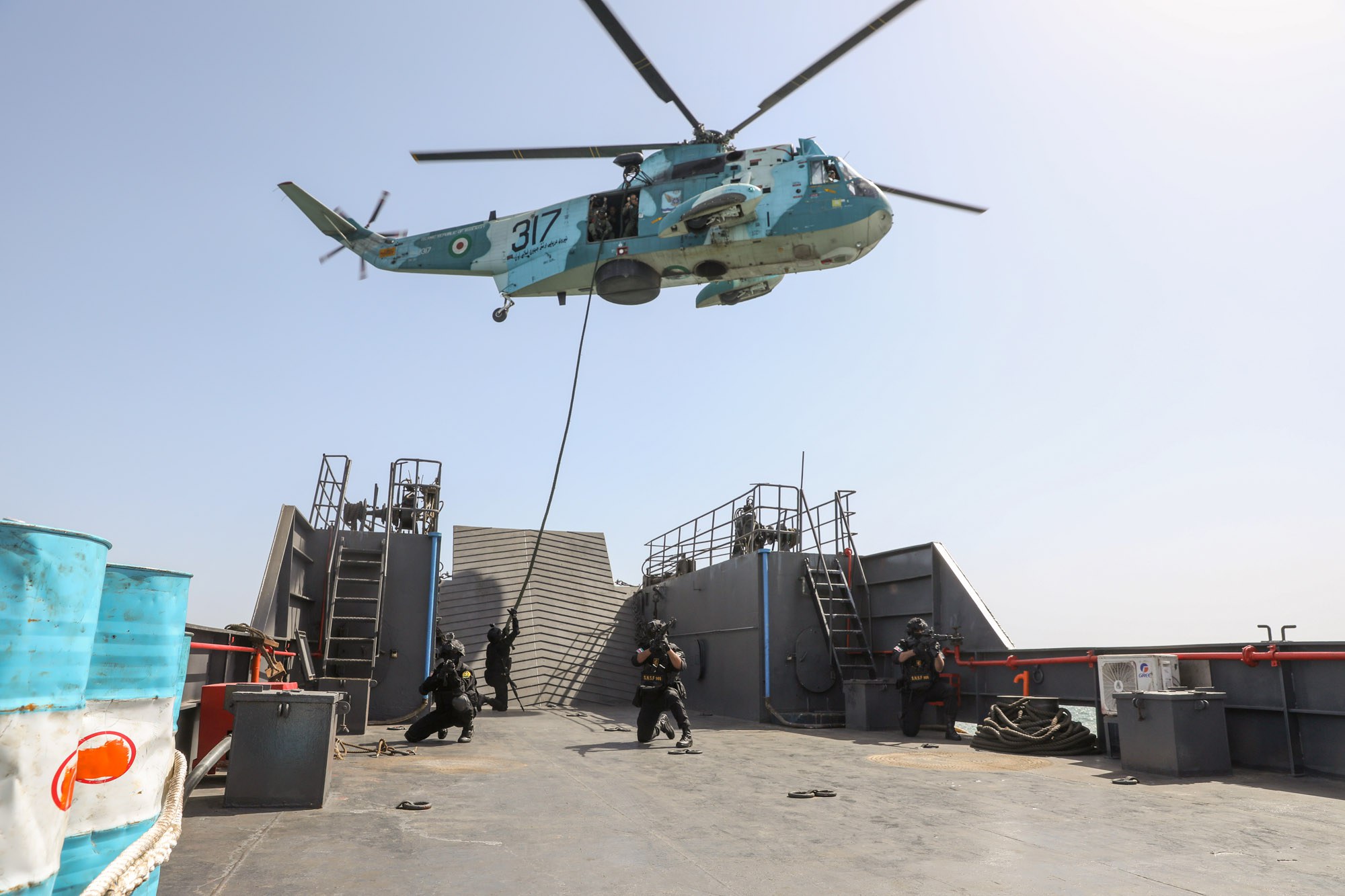 A handout photo made available by the Iranian army shows Iranian and Russian soldiers during a joint naval exercise in Sea of Oman, southern Iran, 19 February 2026. Iran and Russia hold join military drill in the Sea of Oman.  EPA/IRANIAN ARMY OFFICE HANDOUT HANDOUT EDITORIAL USE ONLY/NO SALES