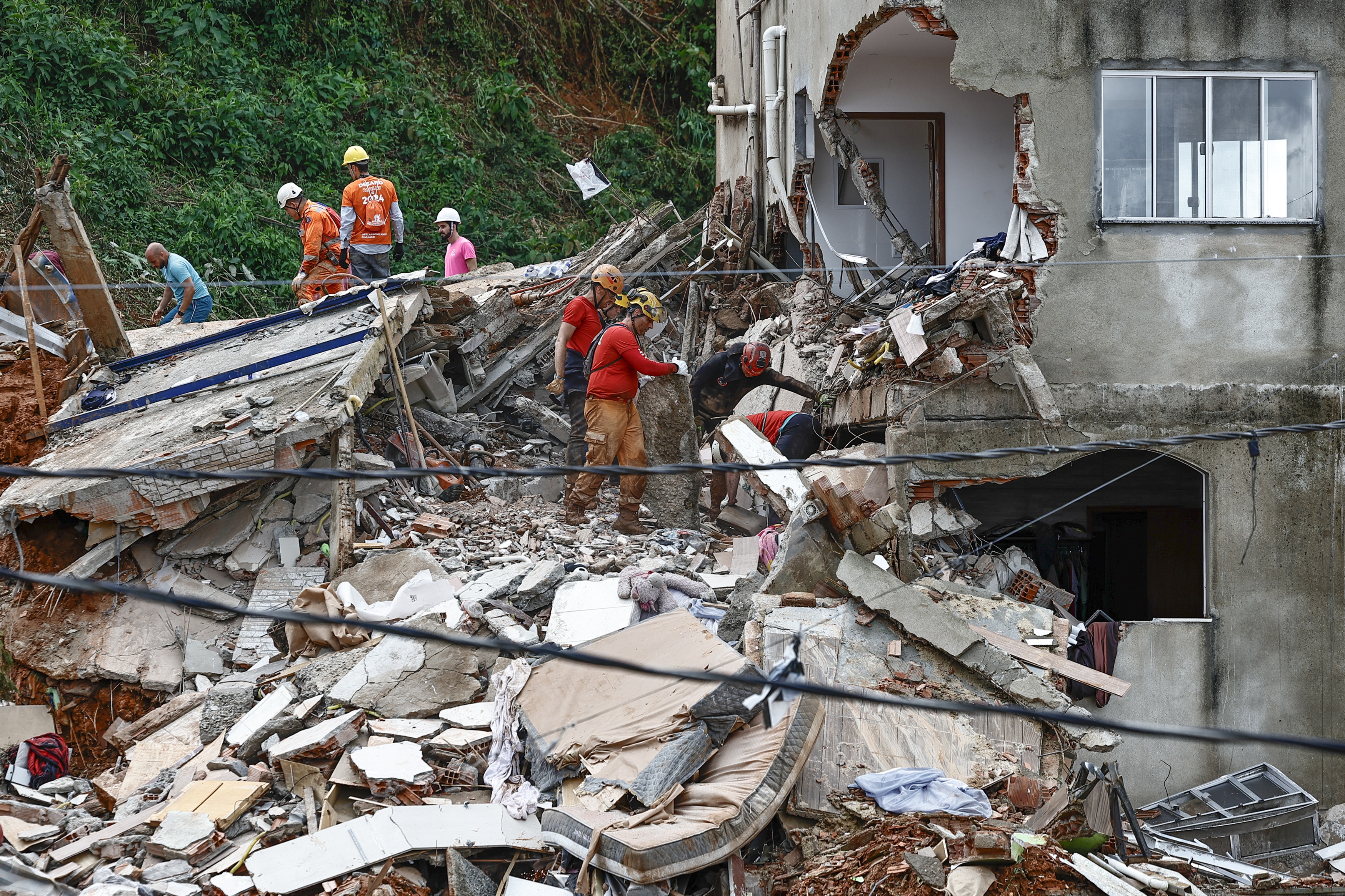 Death and missing people toll rises after heavy rains in southeastern Brazil