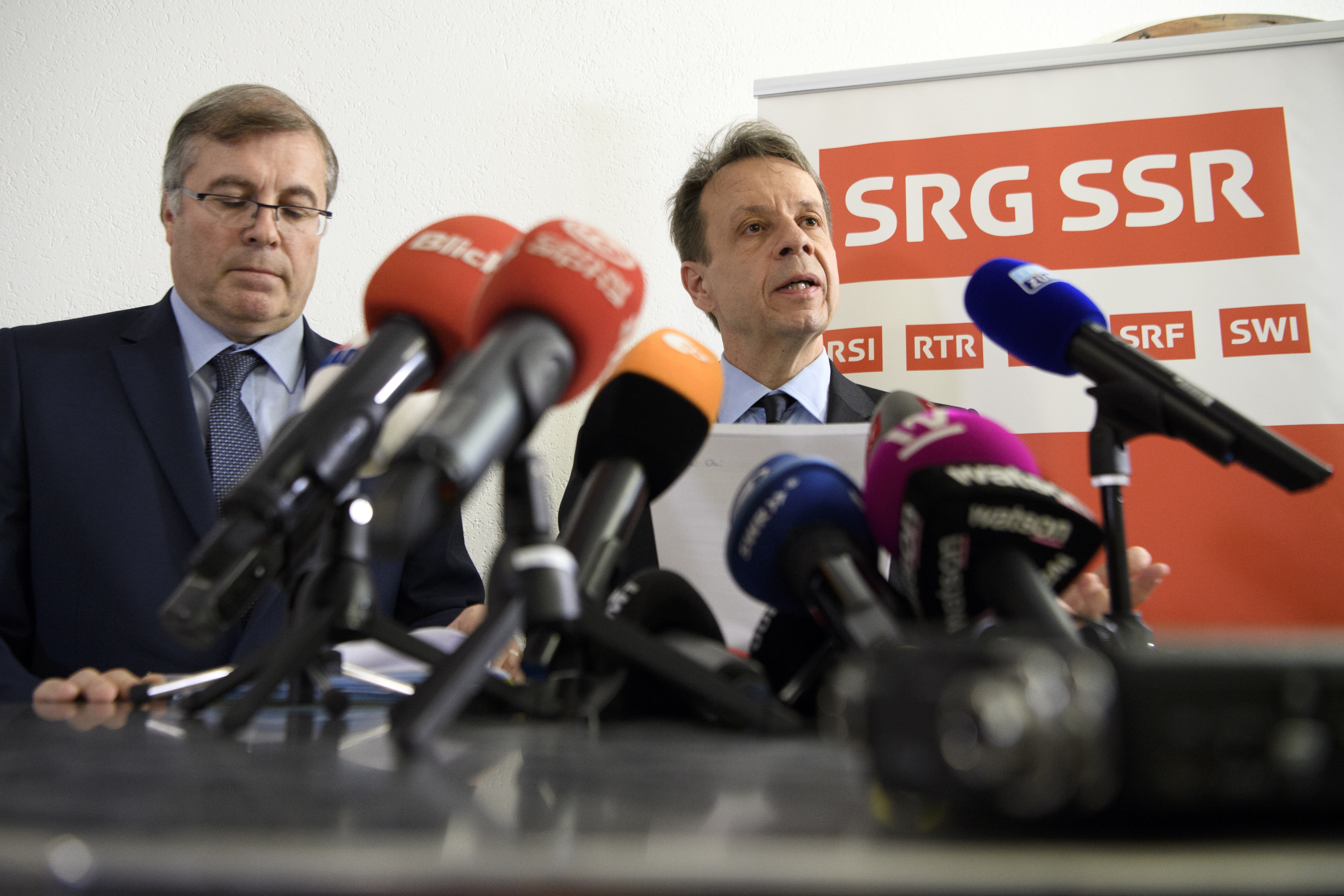 Gilles Marchand (R), Managing Director of SRG SSR, speaks to journalists, next to Michel Cina (L), president SRG SSR, about the result of the vote on the result of the vote on the 'No Billag Initiative', in Bern, Switzerland, 04 March 2018. The initiative aims at abolishing Swiss television and radio licence fees.  EPA/ANTHONY ANEX