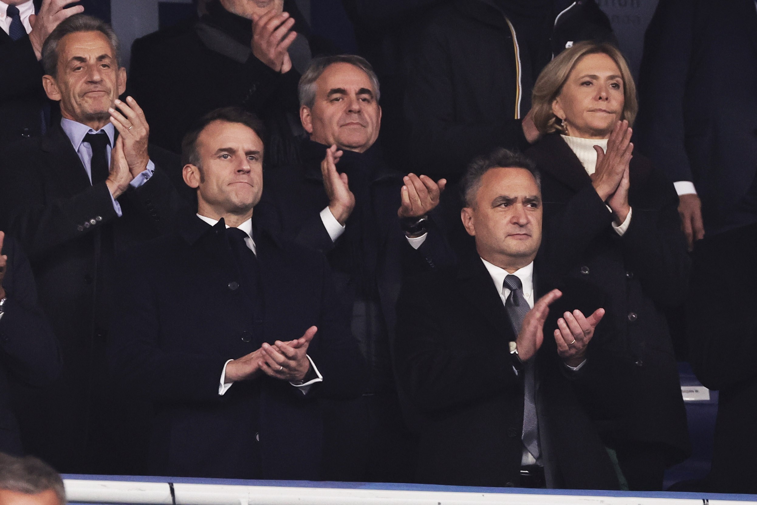 French President Emmanuel Macron (L) and Israeli ambassador to France Joshua Zarka (R) attend the UEFA Nations League soccer match between France and Israel in Saint-Denis, France, 14 November 2024.  EPA/CHRISTOPHE PETIT TESSON