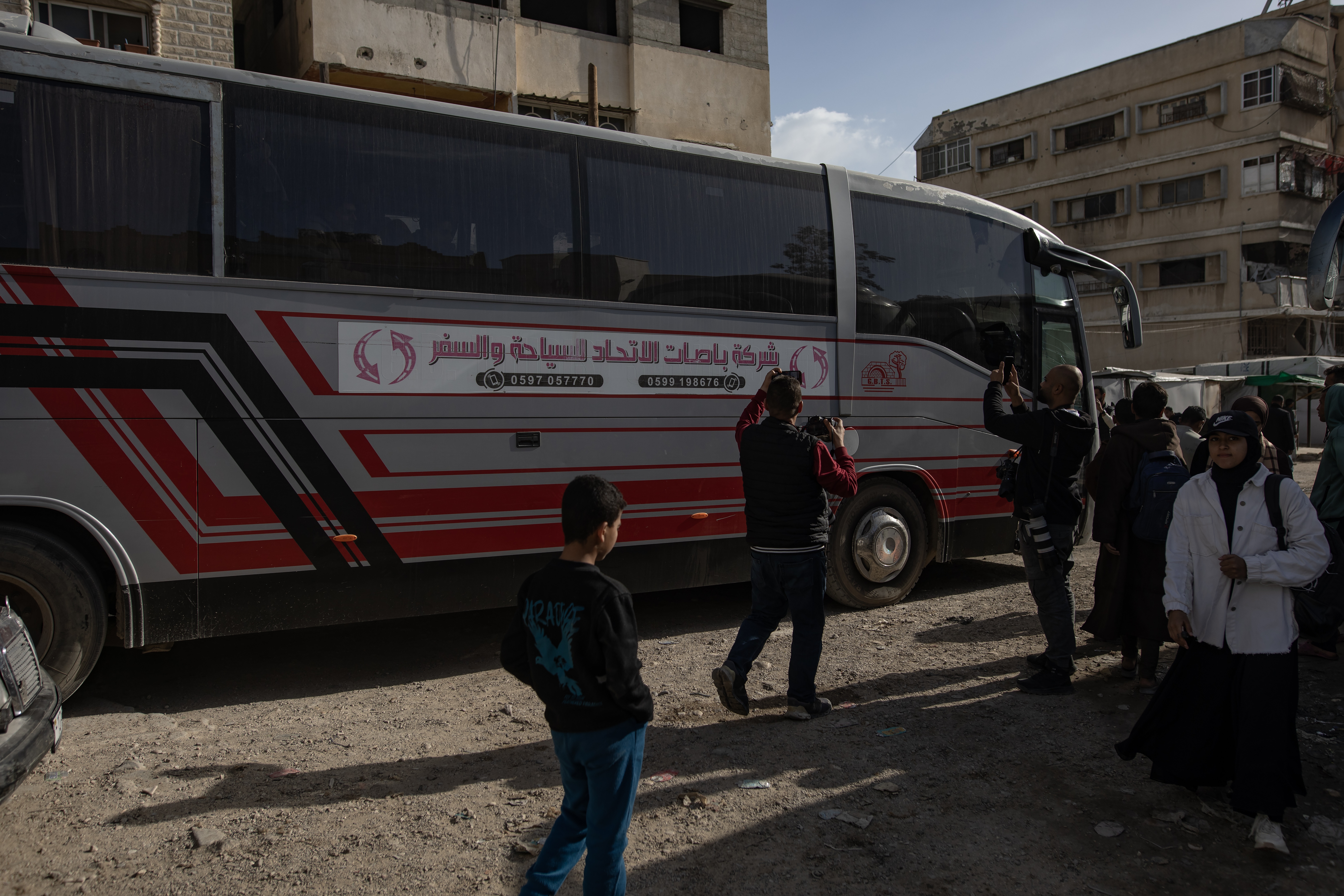 Palestinians gather at the Palestinian Red Crescent Hospital in Khan Younis, southern Gaza Strip, 03 February 2026. A second group of Palestinian patients will be allowed to cross the Rafah border to receive medical treatment, following communication from the World Health Organization (WHO) that they were approved by the Israeli side to travel to Egypt. Israel has reopened the Rafah border between Gaza and Egypt, allowing a limited number of people to cross daily.  EPA/HAITHAM IMAD