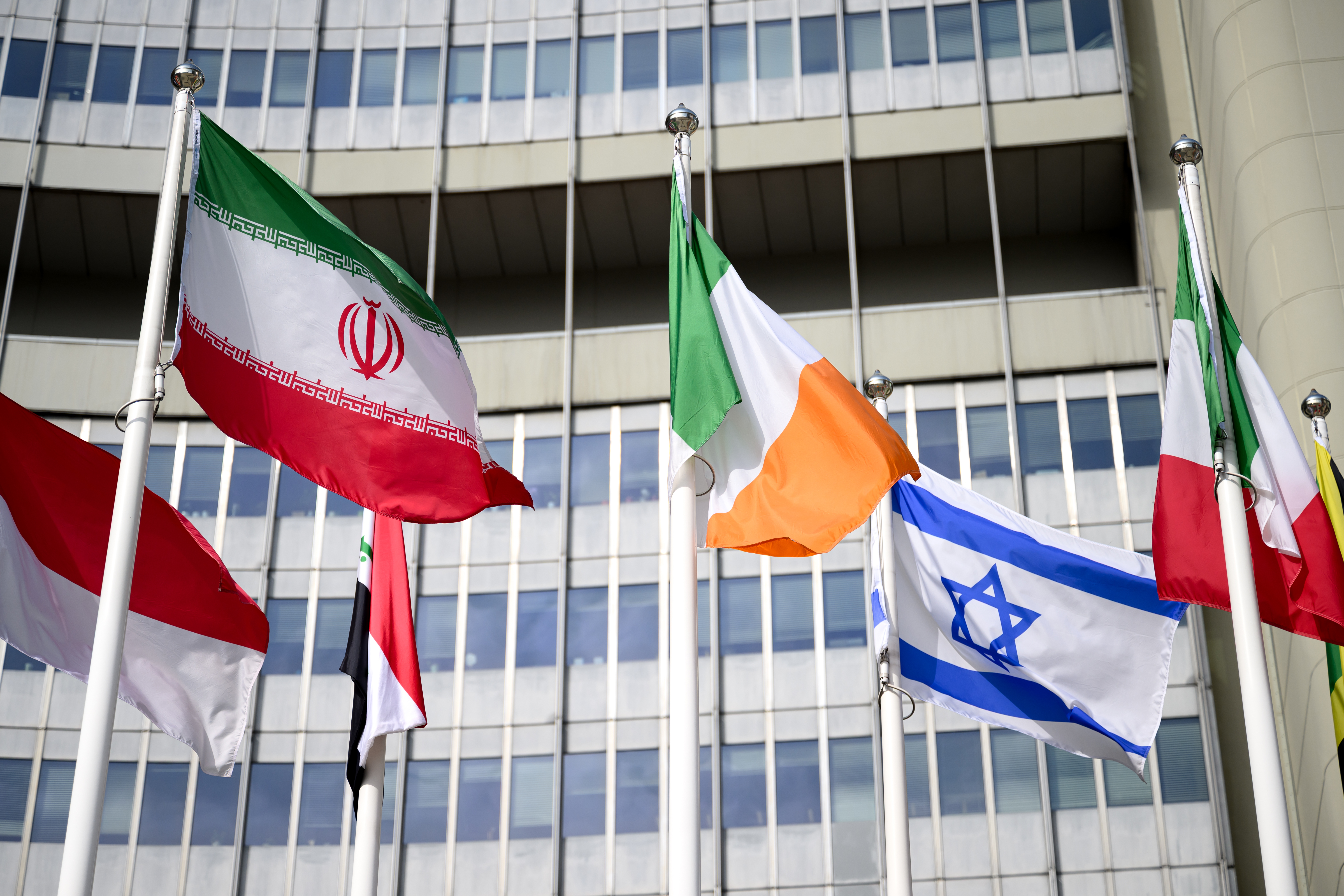 The flags of Iran and Israel during an International Atomic Energy Agency (IAEA) Board of Governors meeting at the IAEA headquarters in Vienna, Austria, 02 March 2026.  EPA/MAX SLOVENCIK