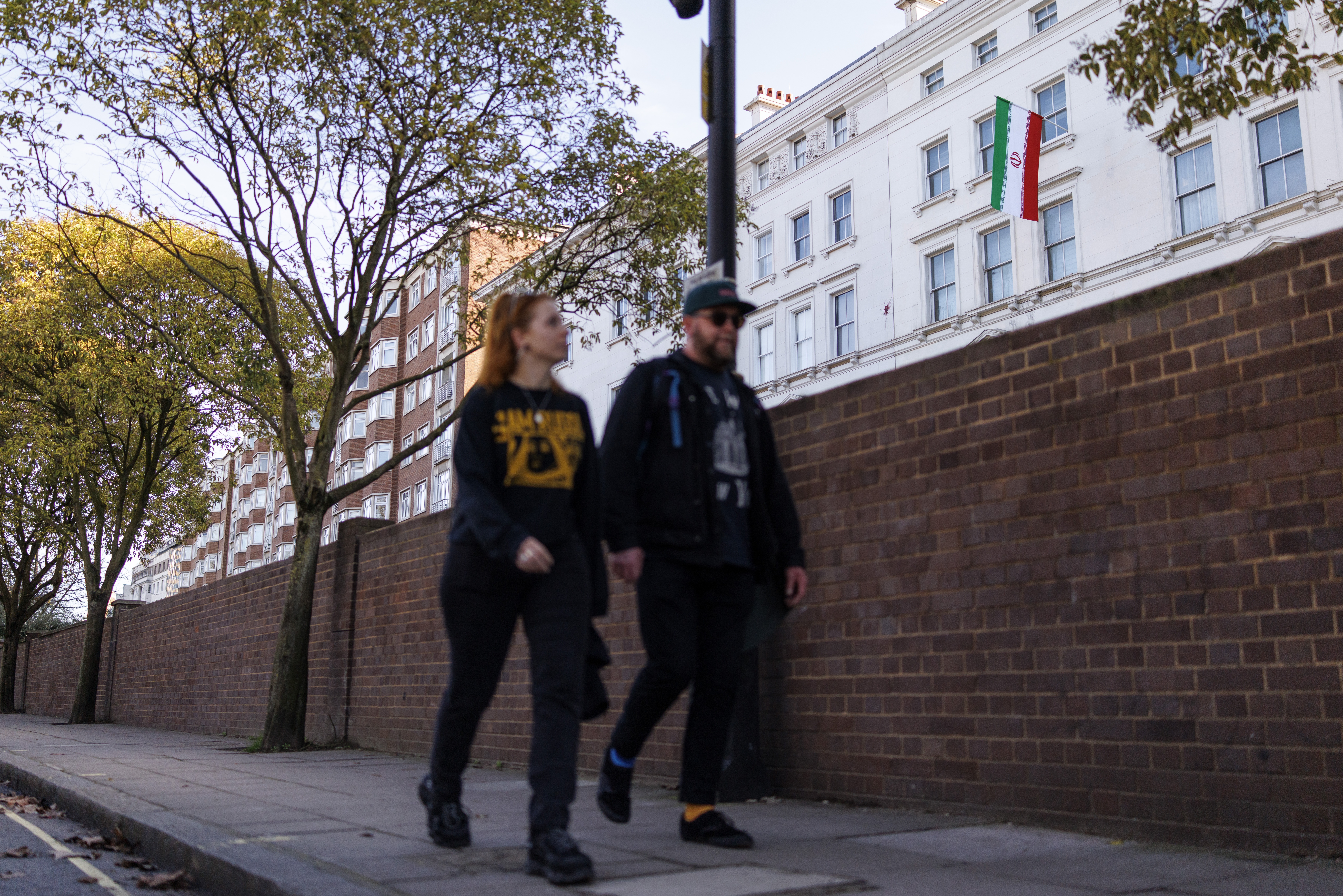 People walk past the Embassy of Iran in London, Britain, 02 March 2026. The US and Israel started airstrikes on Iran on 28 February 2026, killing the country's Supreme Leader Ayatollah Ali Khamenei and triggering Iranian regime's retaliation to a wider conflict across the Middle East.  EPA/TOLGA AKMEN