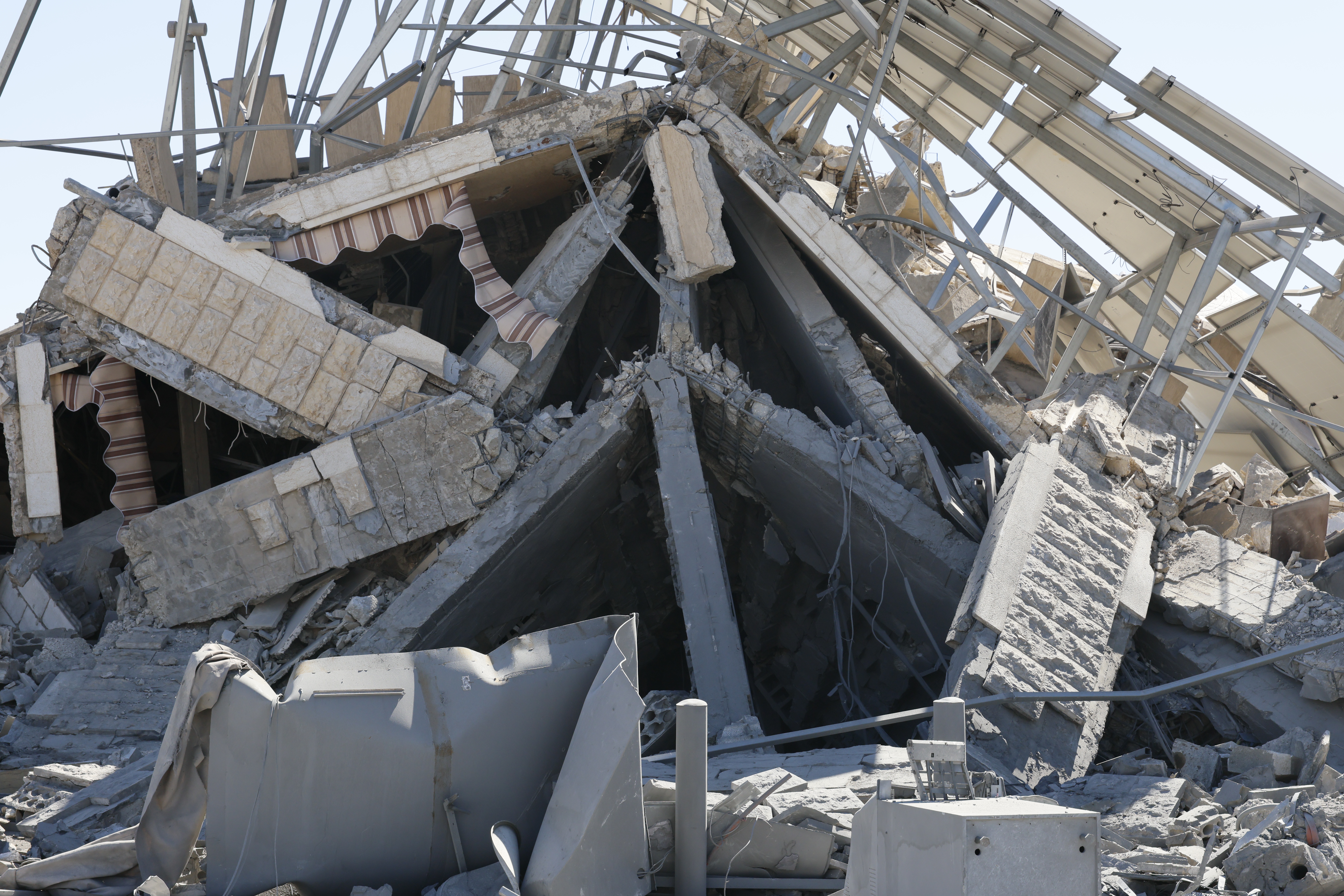 The destroyed branch of the Al-Qard Al-Hassan, Hezbollah financial institution, after an Israeli strike in the area of Douris near Baalbek, in the Bekaa valley, Lebanon, 05 March 2026. The Israeli military stated it is conducting strikes across the country targeting Hezbollah infrastructure and personnel.  EPA/WAEL HAMZEH