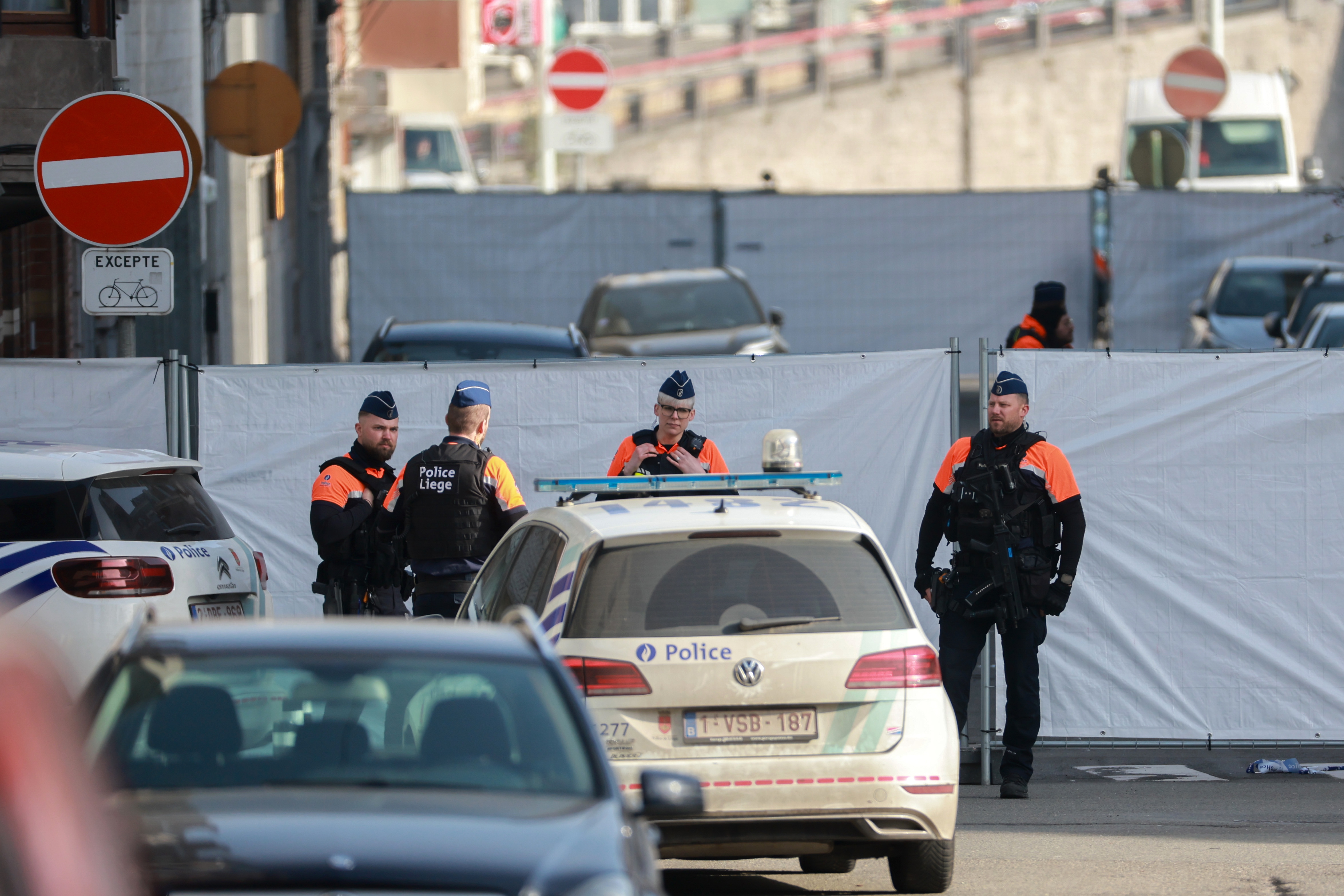 Police officers secure the area outside a synagogue after an explosion in Liege, Belgium, 09 March 2026. The blast occurred at around 04:00 local time outside the synagogue on Rue Leon Fredericq, shattering windows and causing material damage, while no injuries were reported, as Belgian authorities launched an investigation into the incident.  EPA/OLIVIER HOSLET