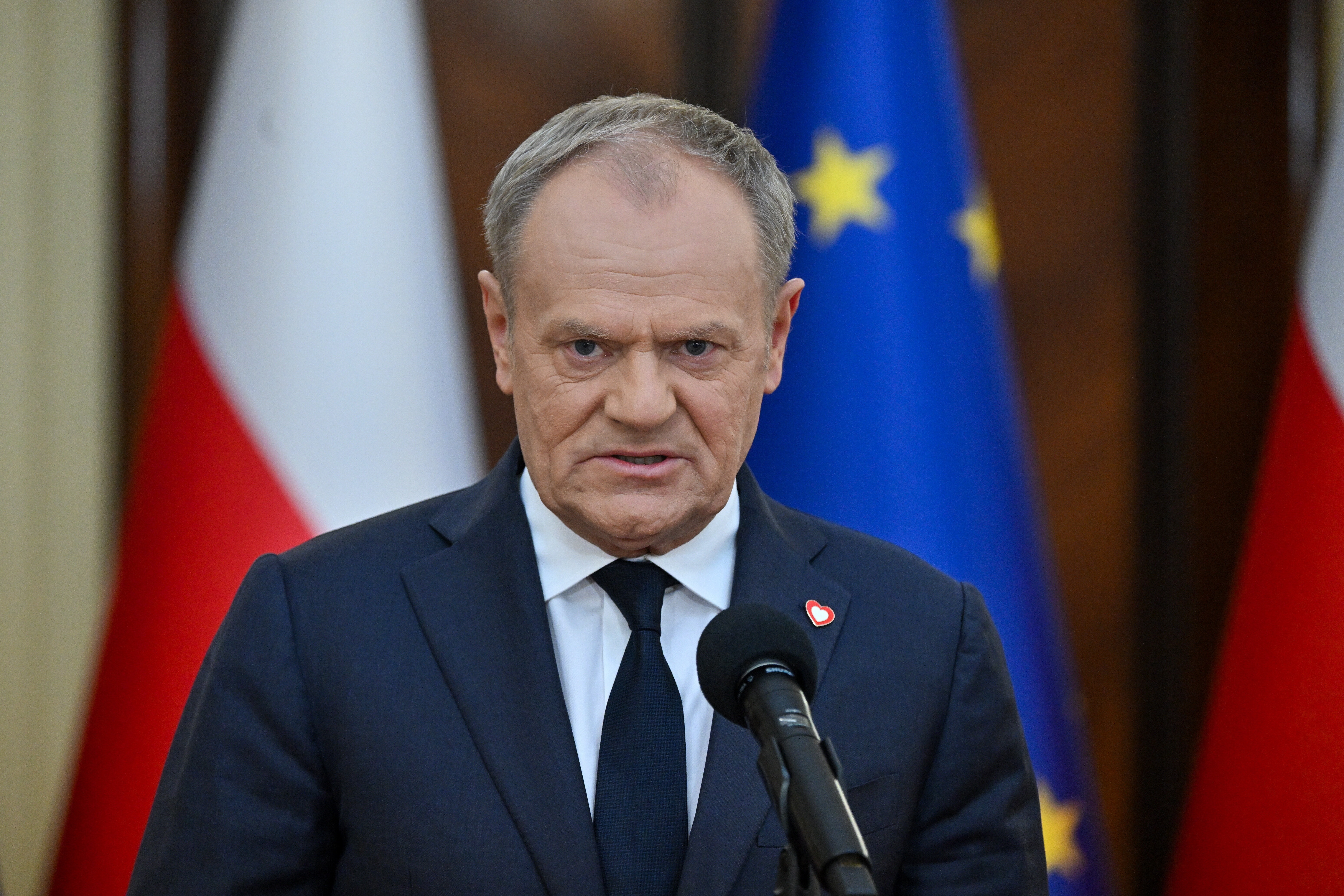 Polish Prime Minister Donald Tusk speaks during a press conference at the Chancellery of the Prime Minister, after meeting with the President of the Republic of Poland Nawrocki in Warsaw, Poland, 10 March 2026. The meeting at the Presidential Palace focused on the proposal by the president, the 'Polish SAFE 0%', a veto to a bill implementing the EU's SAFE defence loan programme.  EPA/Piotr Nowak POLAND OUT