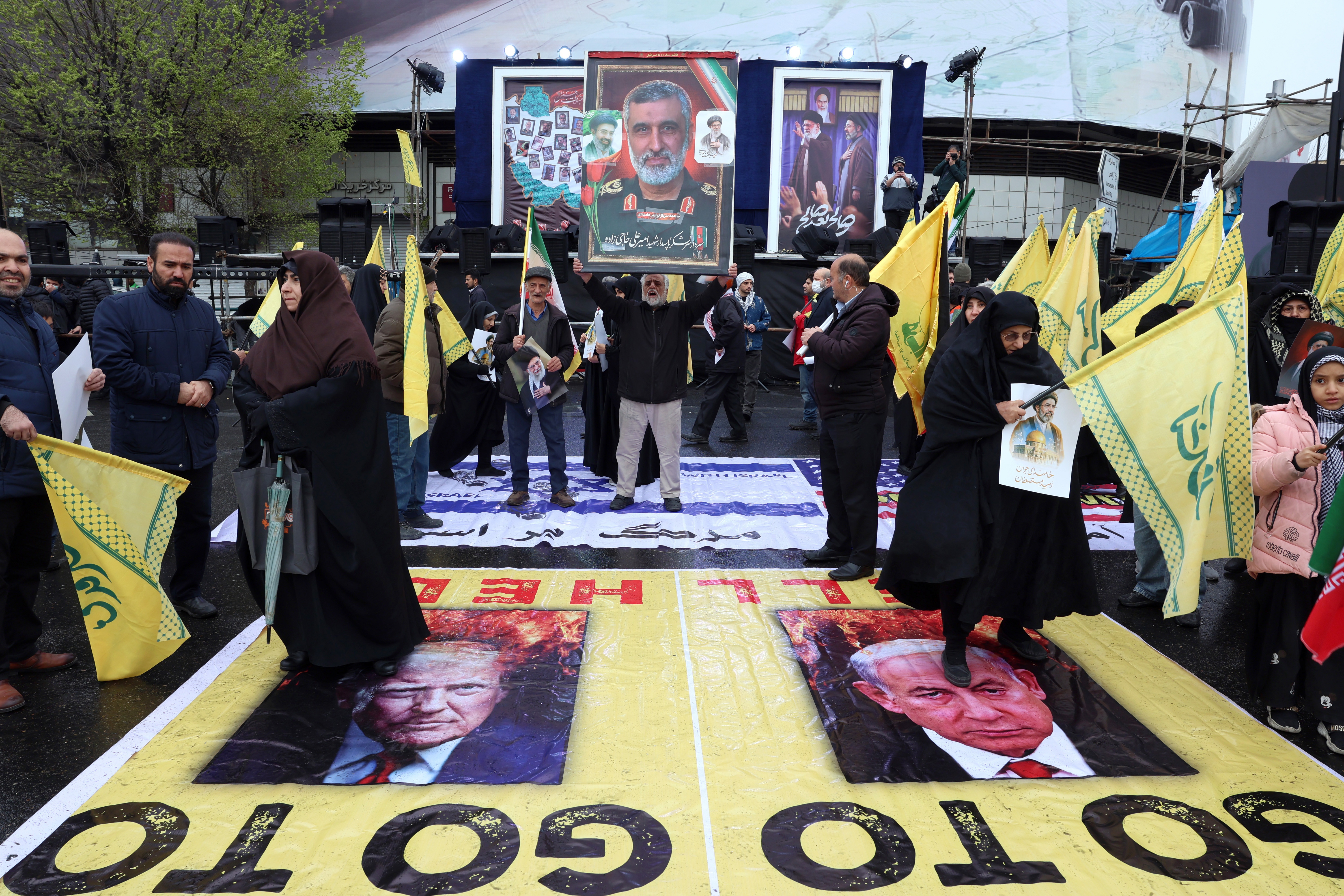 Iranians stomp on posters showing US president Donald Trump and Israel Prime Minister Benjamin Netanyahu during a rally to mark mark International Quds Day in Tehran, Iran, 13 March 2026. Established in 1979, Quds Day is observed annually on the last Friday of Ramadan to express solidarity with the Palestinian people and protest Israeli control of Jerusalem. This year's observance takes place as a joint US and Israeli military operation, launched on 28 February, continues to target strategic sites across Iran.  EPA/ABEDIN TAHERKENAREH