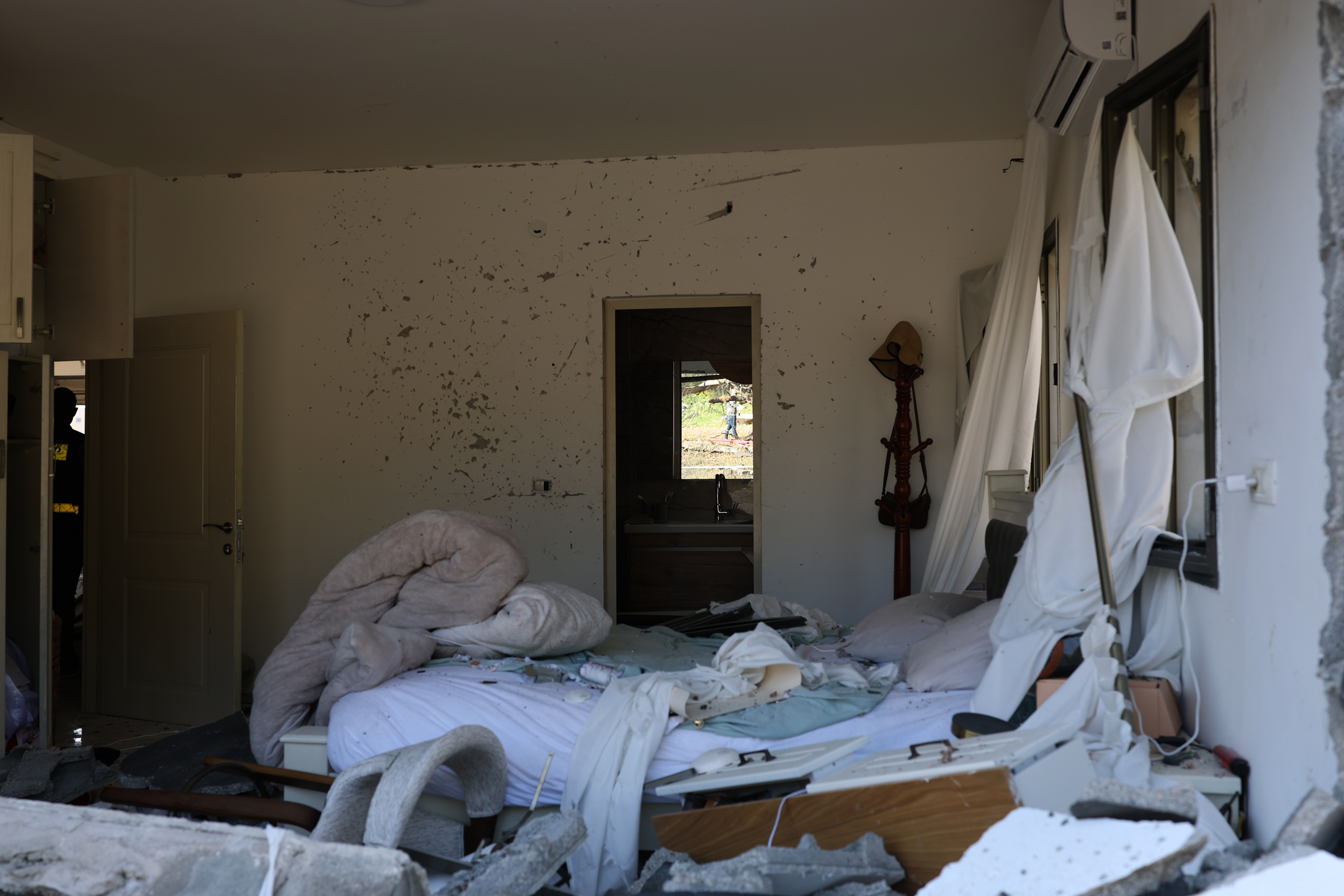 A view of the destruction at a property following a rocket strike in Zarzir, Israel, 13 March 2026. According to Magen David Adom (MDA) teams and paramedics, at least 58 people were treated and taken to hospitals in northern Israel, including one in moderate condition and 57 in very mild condition.  EPA/ATEF SAFADI