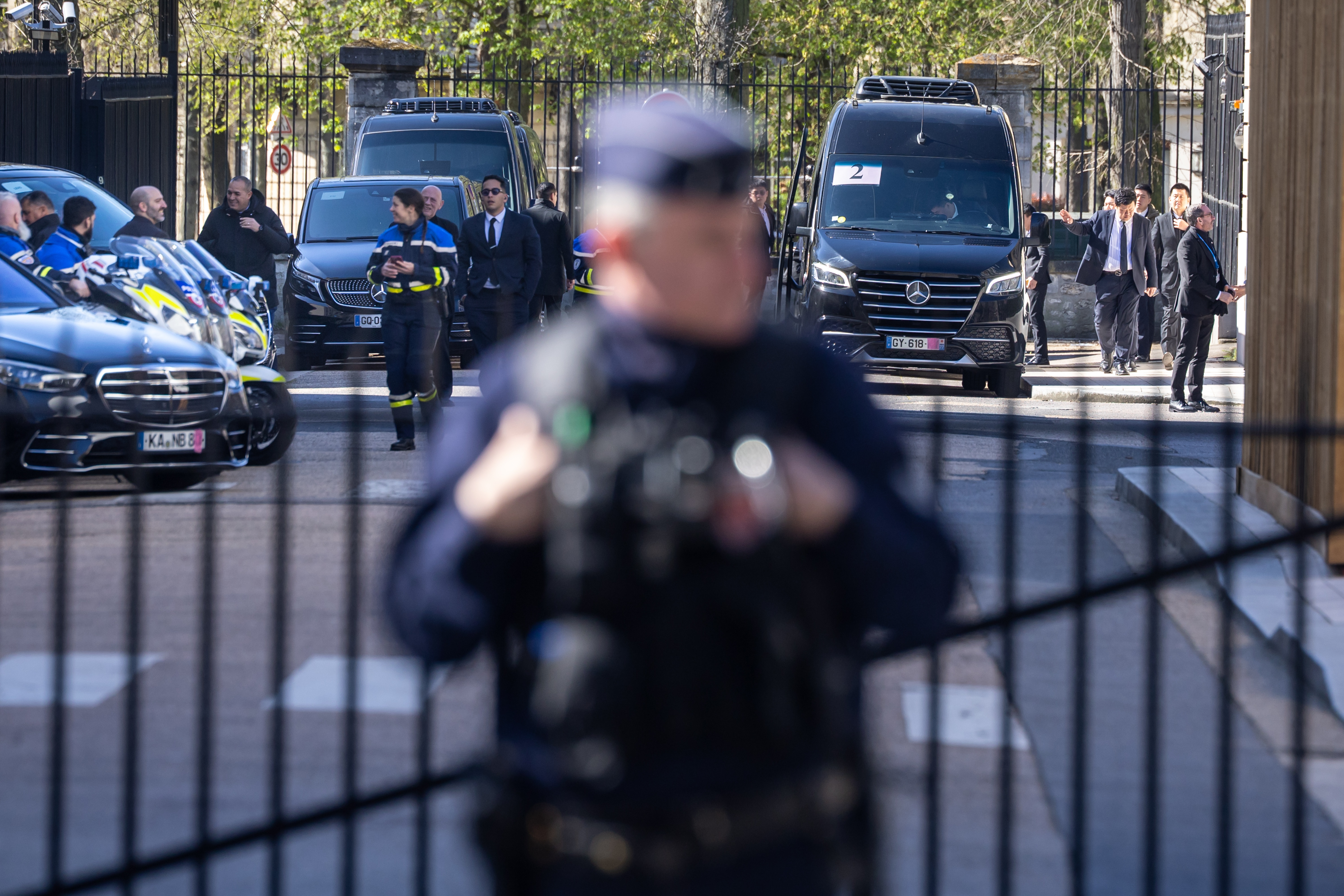 French police forces secure the area outside the Organisation for Economic Co-operation and Development (OECD) headquarters as Chinese and U.S. delegations start economic and trade talks in Paris, France, 15 March 2026.  EPA/CHRISTOPHE PETIT TESSON