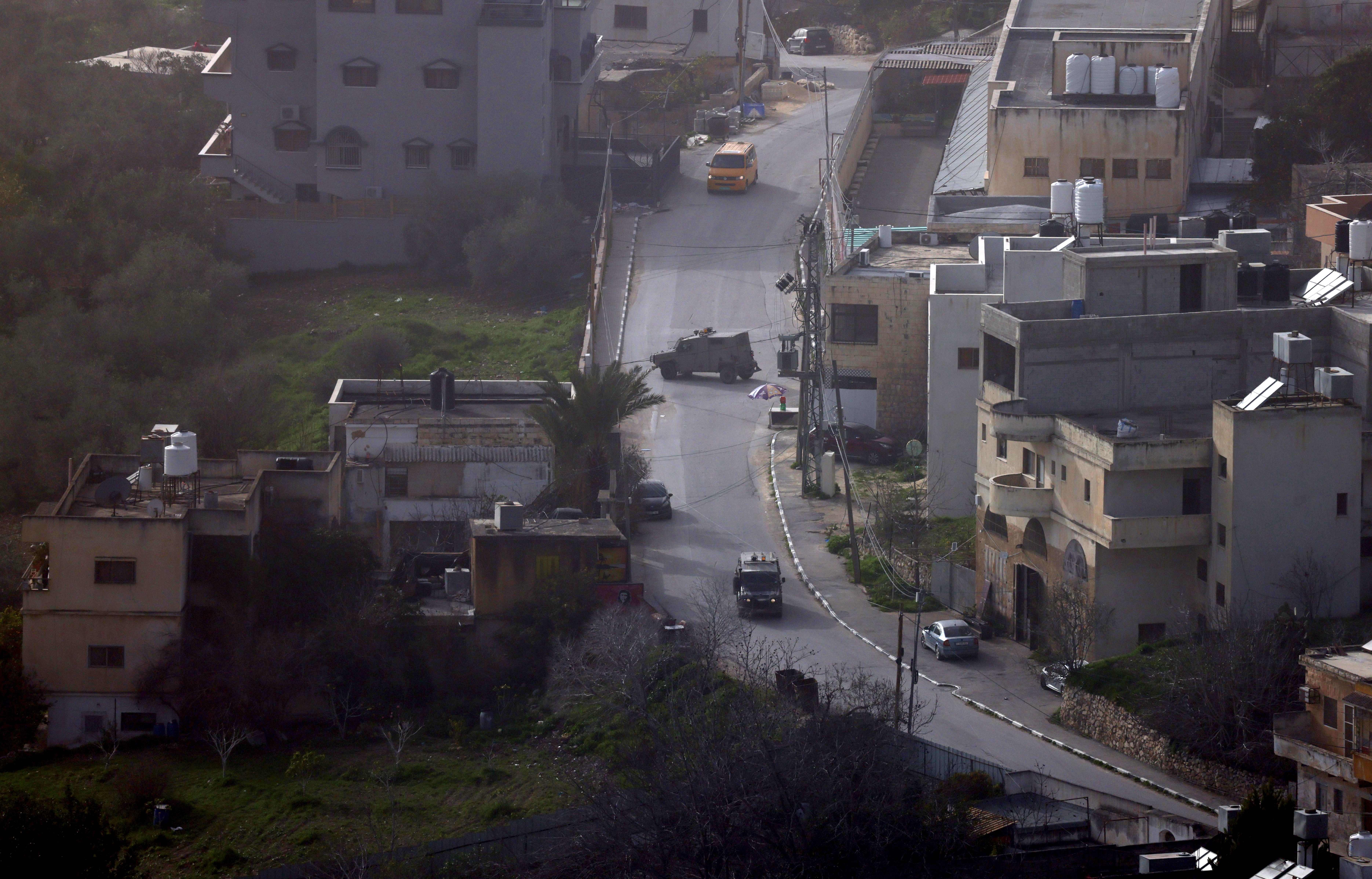 Israeli troops conduct a military raid in the Palestinian village of Burqa, northwest of Nablus, West Bank, 02 February 2026. UNRWA Commissioner-General Philippe Lazzarini warned on 01 February that the territory is witnessing a 'silent war' where record violence by both the military and settlers since October 2023 has resulted in over 1,000 Palestinian deaths and the displacement of thousands. Lazzarini stated that the 'flagrant disregard for international humanitarian law has been normalized' and must stop before it is too late.  EPA/ALAA BADARNEH