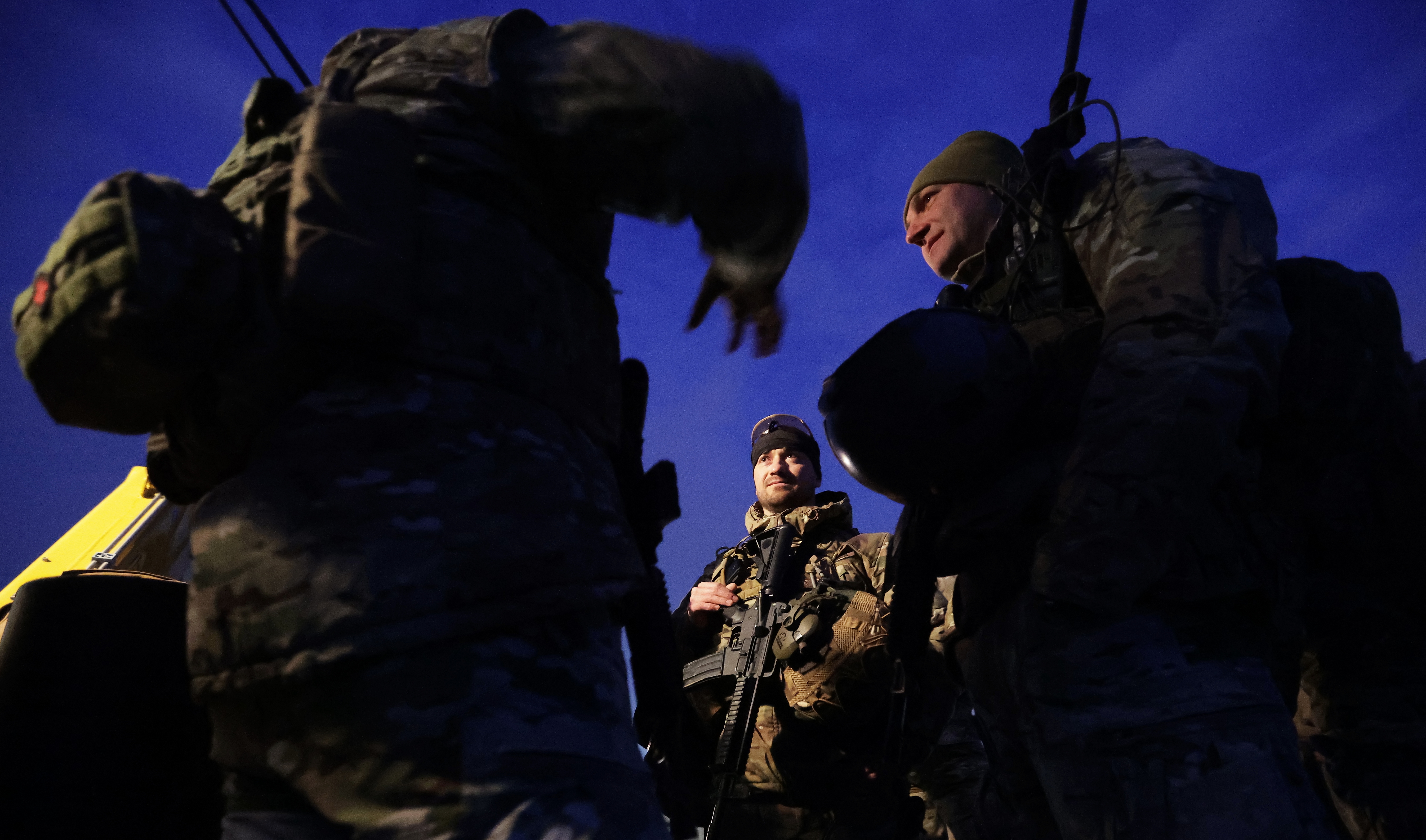 Romanian Navy Special Operations Forces troops chat before embarking onboard of the Romanian Navy frigate 'King Ferdinand' (not pictured) during the NATO naval drill 'Sea Shield 26' in the Black Sea, off the coast of Constanta, Romania, 24 March 2026. Over 2,500 troops from Romania and 12 allied NATO countries participate in the multinational Sea Shield 2026 exercise in the Black Sea, from 23 March to 03 April, the largest drill organized by the Romanian Naval Forces this year.  EPA/ROBERT GHEMENT