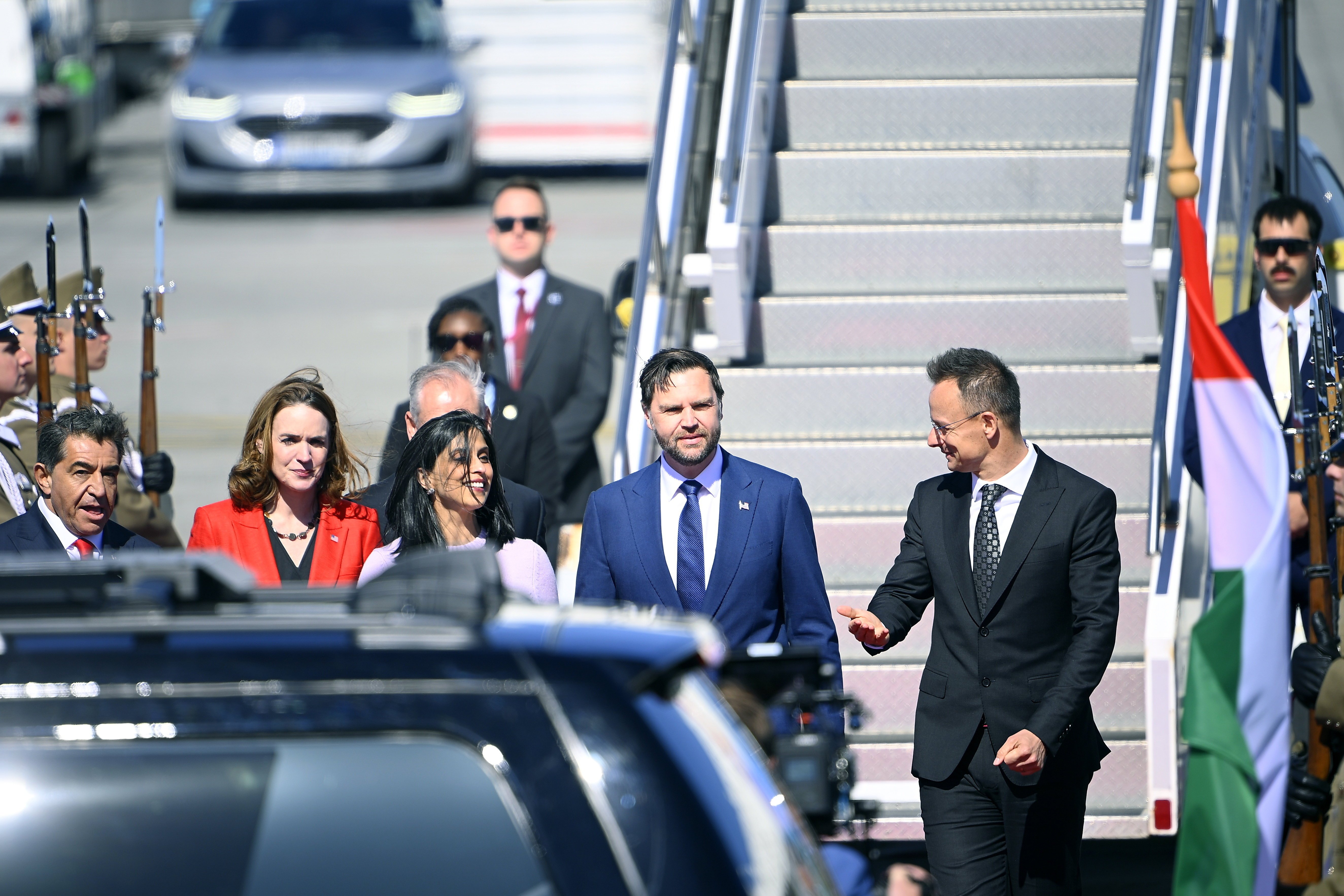 Hungarian Minister of Foreign Affairs and Trade Peter Szijjarto (R) welcomes U.S. Vice President JD Vance (2-R) and Second Lady Usha Vance (3-R), flanked by Charge d'Affaires of the US Embassy in Hungary Caroline Savage (2-L) at Liszt Ferenc International Airport in Budapest, Hungary, 07 April 2026. Vance is on a two-day visit to Hungary.  EPA/Zsolt Szigetvary HUNGARY OUT