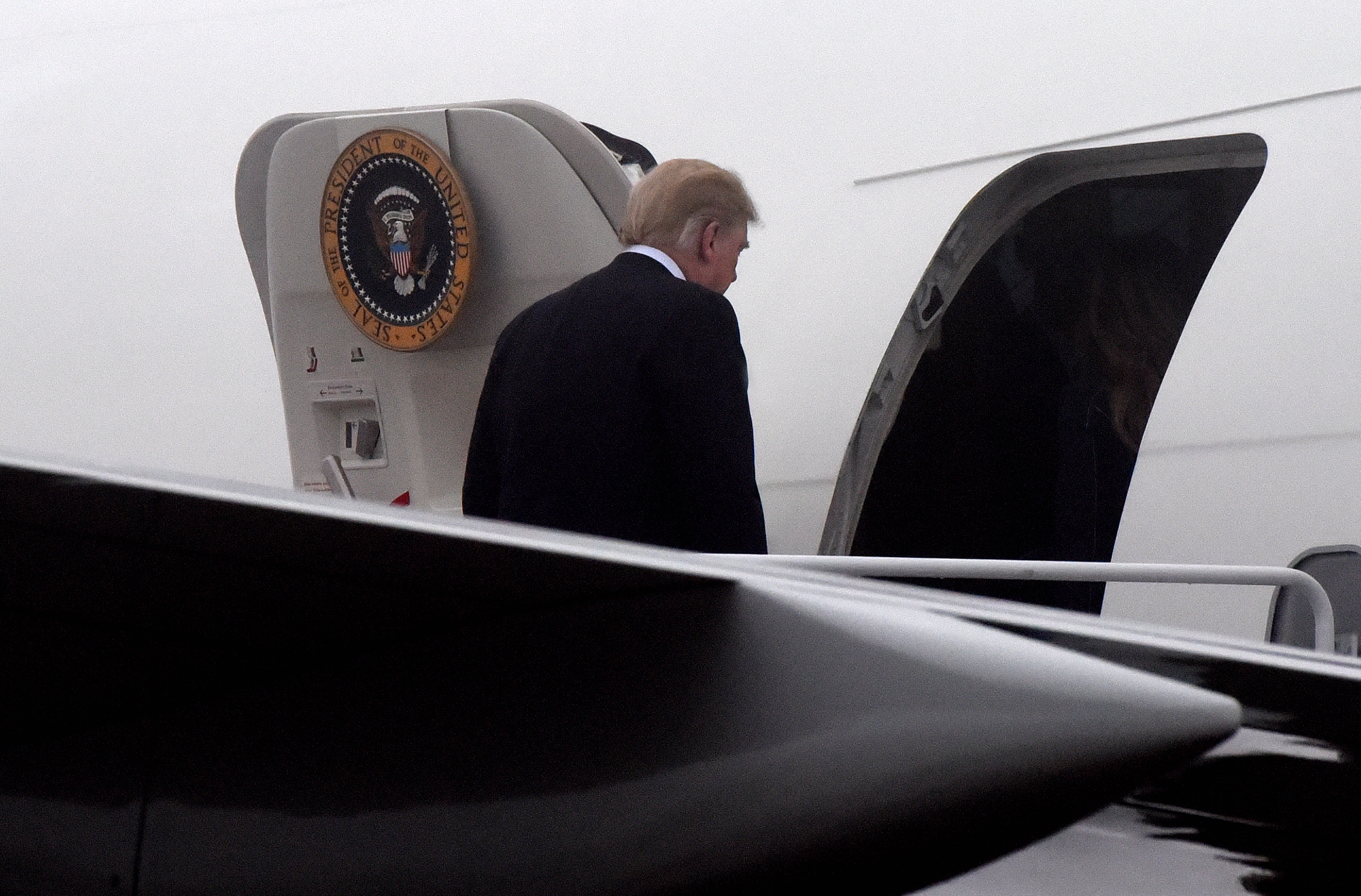 US President Donald Trump walks to Air Force One before departing from Joint Andrews Airforce base, Maryland, USA, 11 September 2018. President Trump and First Lady will attend the 17th Annual September 11 Observance at the Flight 93 National Memorial in Shanksville, Pennsylvania.  EPA/OLIVIER DOULIERY / POOL
