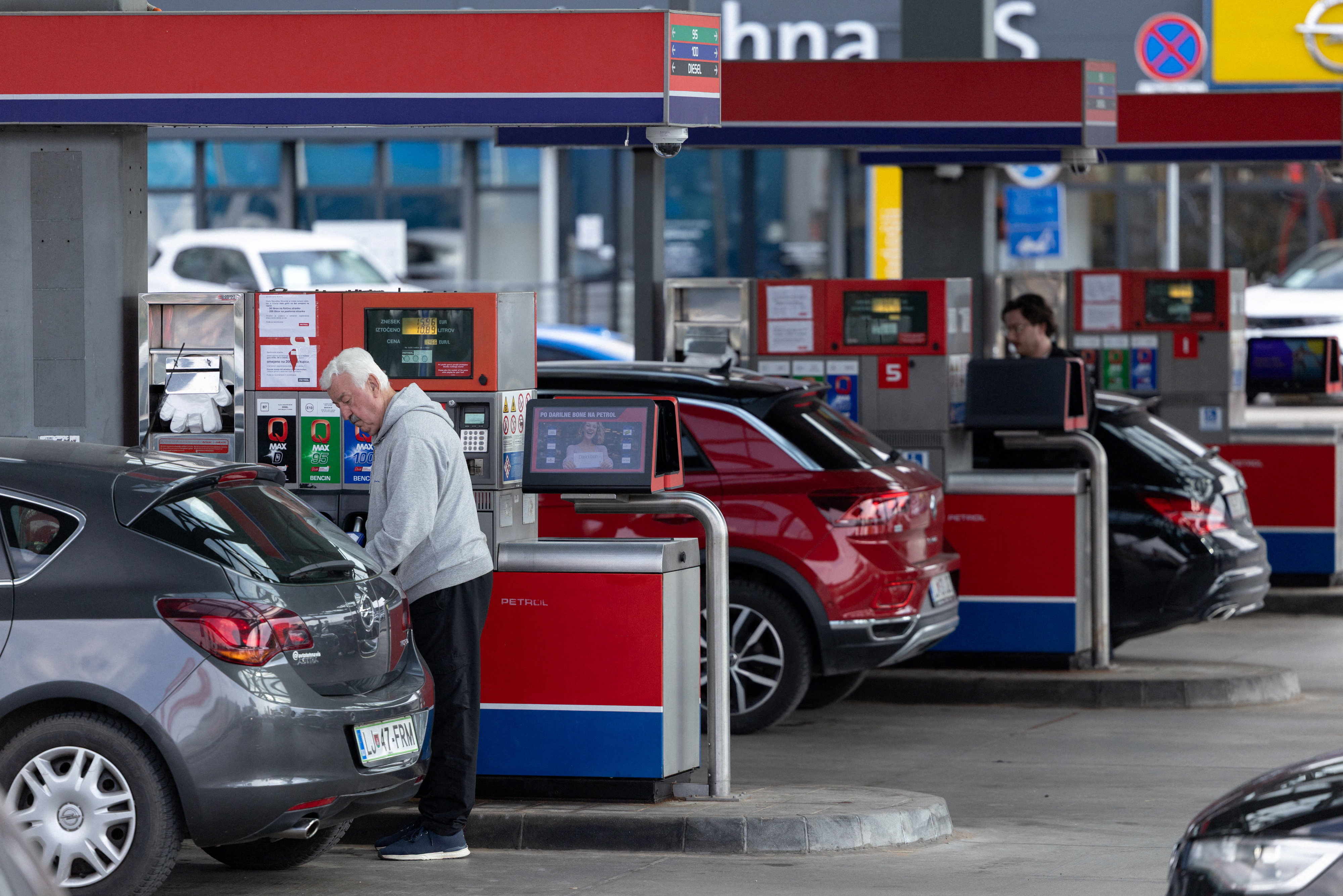 Vehicles queue at a petrol station in Ljubljana