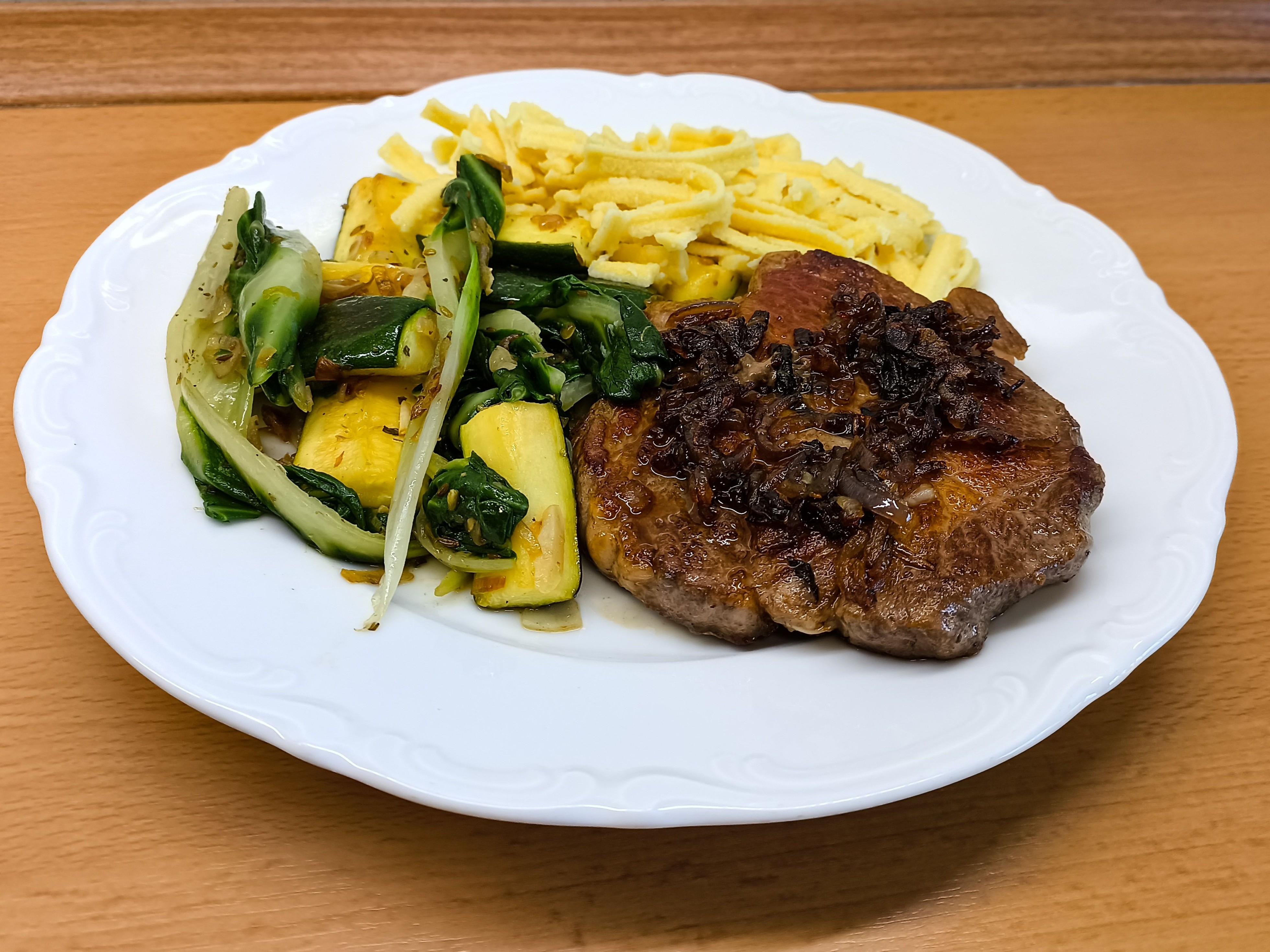 Pork neck with courgettes, Swiss chard and pasta (plus: lamb shanks Youvetsi)