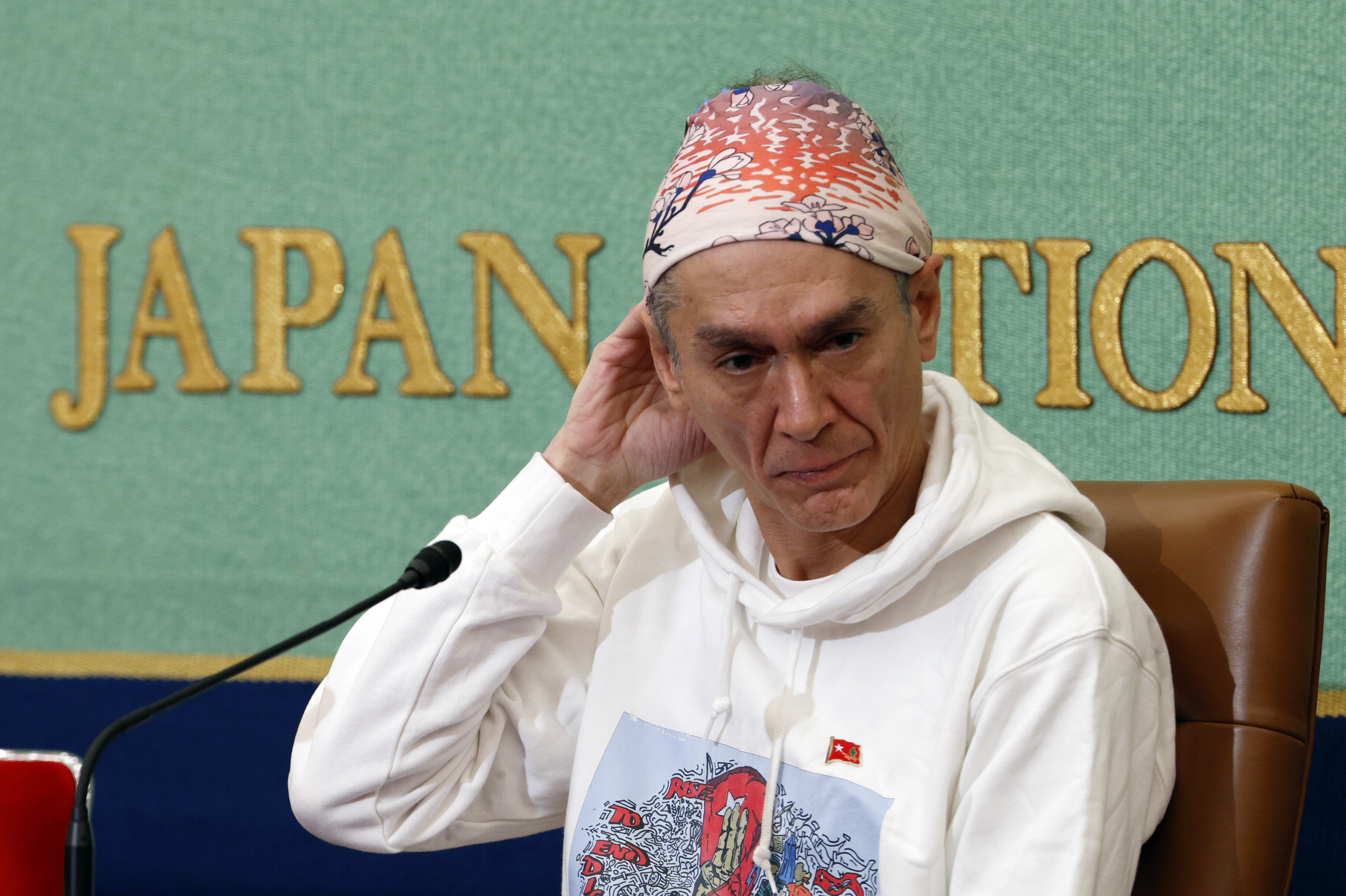Kim Aris, son of Aung San Suu Kyi, attends a press conference at the Japan National Press Club in Tokyo, Japan, 15 December 2025. The second son of jailed Burmese leader Aung San Suu Kyi expressed concern about his mother, who turned 80 earlier this year, as her health is deteriorating. Aung San Suu Kyi is a Nobel Peace Prize laureate and former civilian leader of Myanmar who has been detained since the 2021 military coup.  EPA/FRANCK ROBICHON