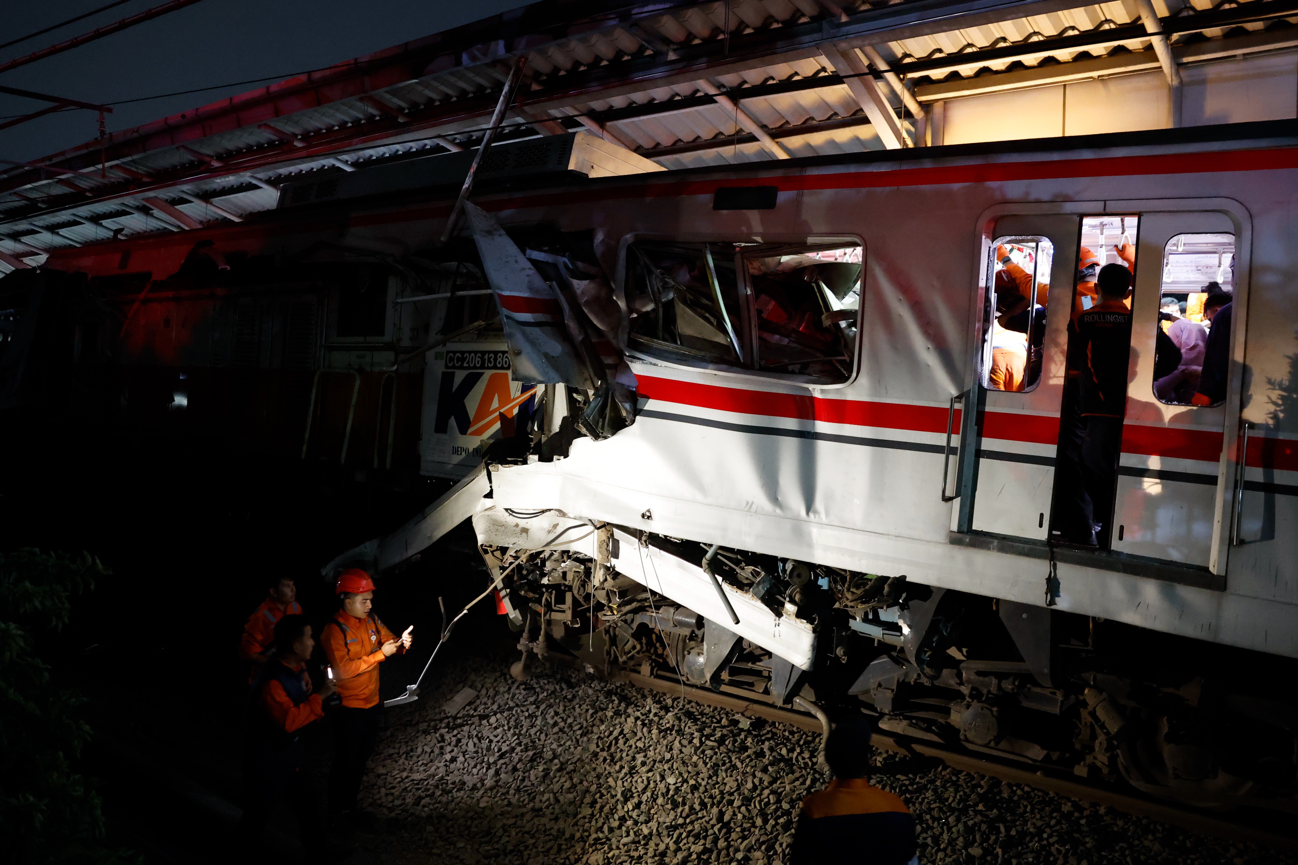 Rescue workers evacuate passengers from a train accident at the East Bekasi train station in Jakarta, Indonesia, 27 April 2026. Several passengers were injured when two trains collided at the station.  EPA/MAST IRHAM