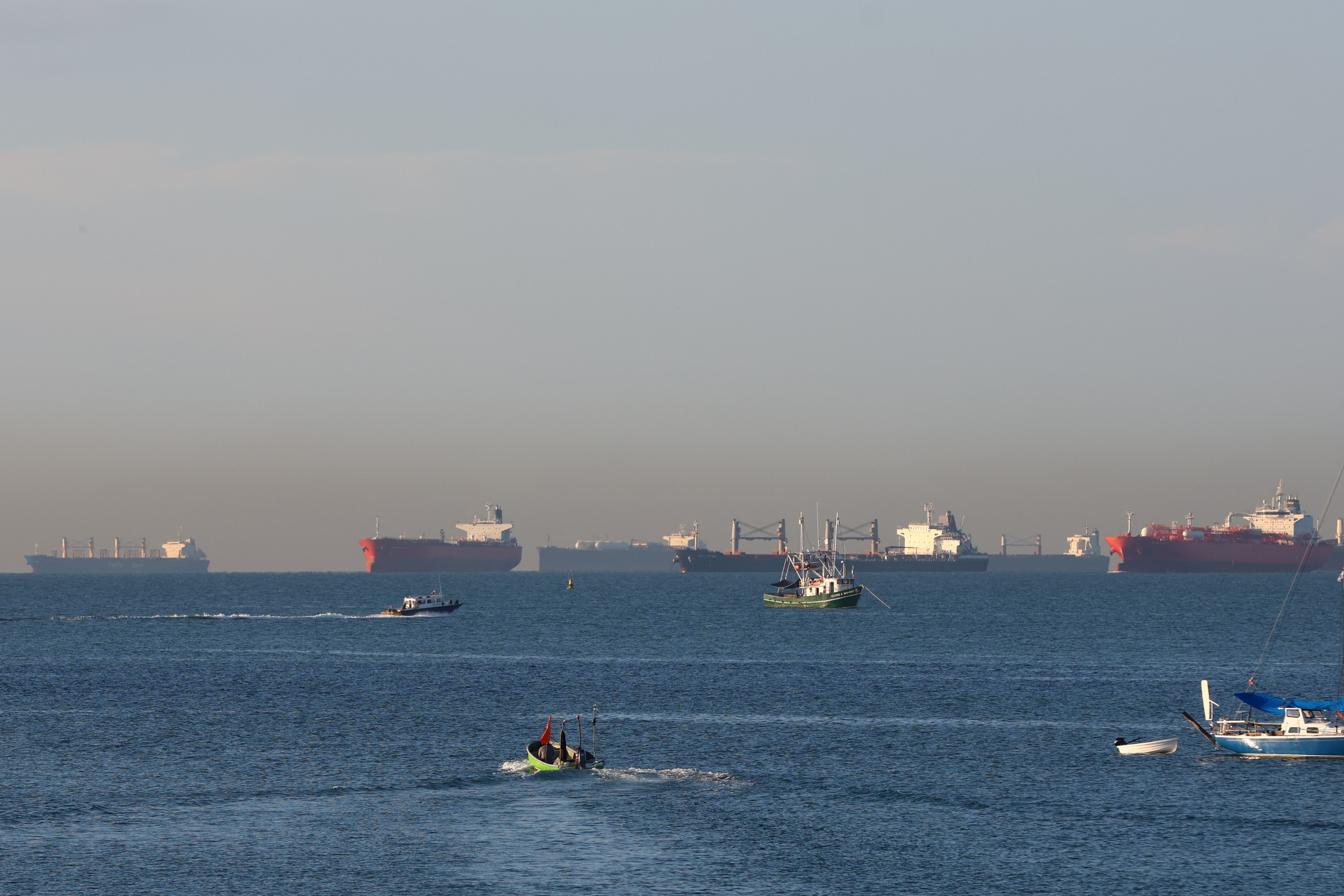 Ships transit the Panama Canal in Panama City, Panama, 28 April 2026. The canal is handling up to 41 daily transits, above the usual 36, thanks to high water levels in the artificial lakes that feed it. Despite increased demand linked to the crisis in the Strait of Hormuz, the waterway is operating at full capacity without congestion, according to canal administrator Ricaurte Vasquez.  EPA/Carlos Lemos