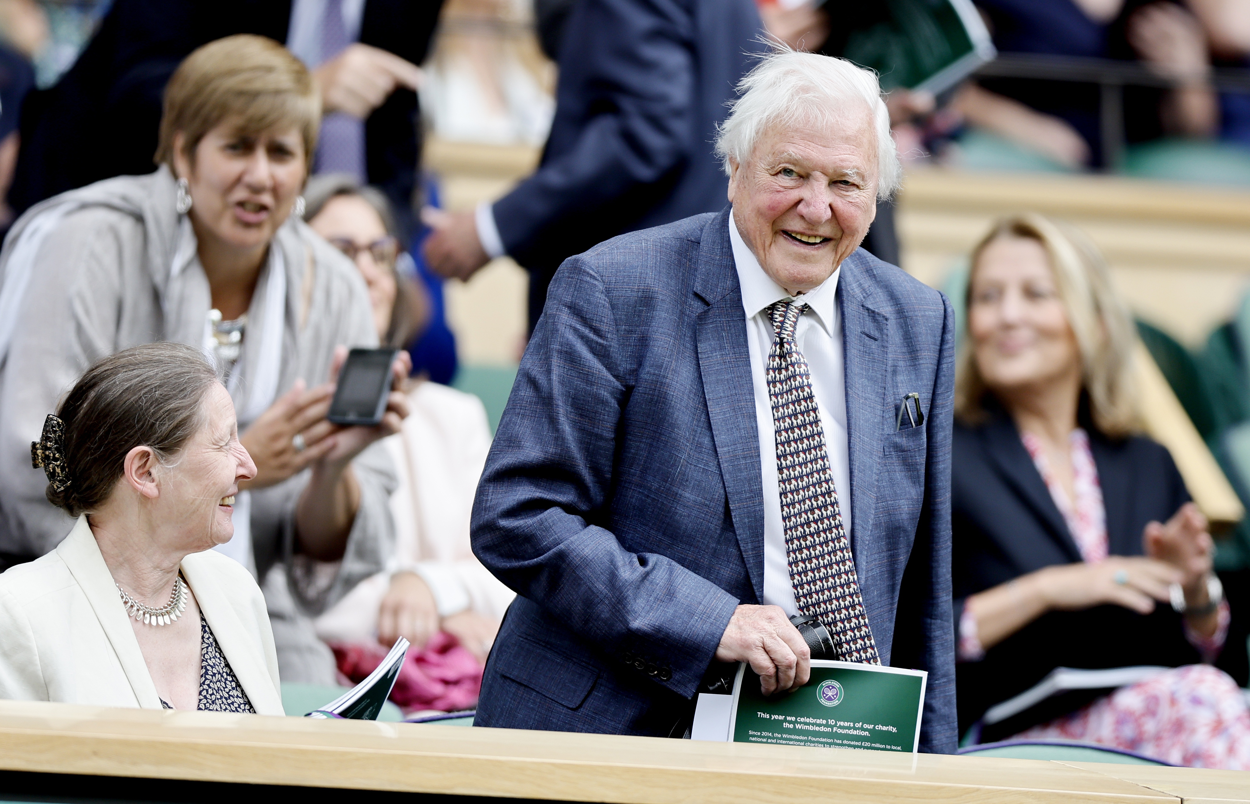 Sir David Attenborough takes seat at Centre Court on the first day at the Wimbledon Championships, Wimbledon, Britain, 01 July 2024 (reissued 07 May 2026). Sir David Attenborough turns 100 years old on 08 May 2026. He is known for a pioneering BBC career that transformed natural history broadcasting and for inspiring generations with iconic wildlife documentaries and international environmental advocacy.  EPA/TOLGA AKMEN EDITORIAL USE ONLY EDITORIAL USE ONLY