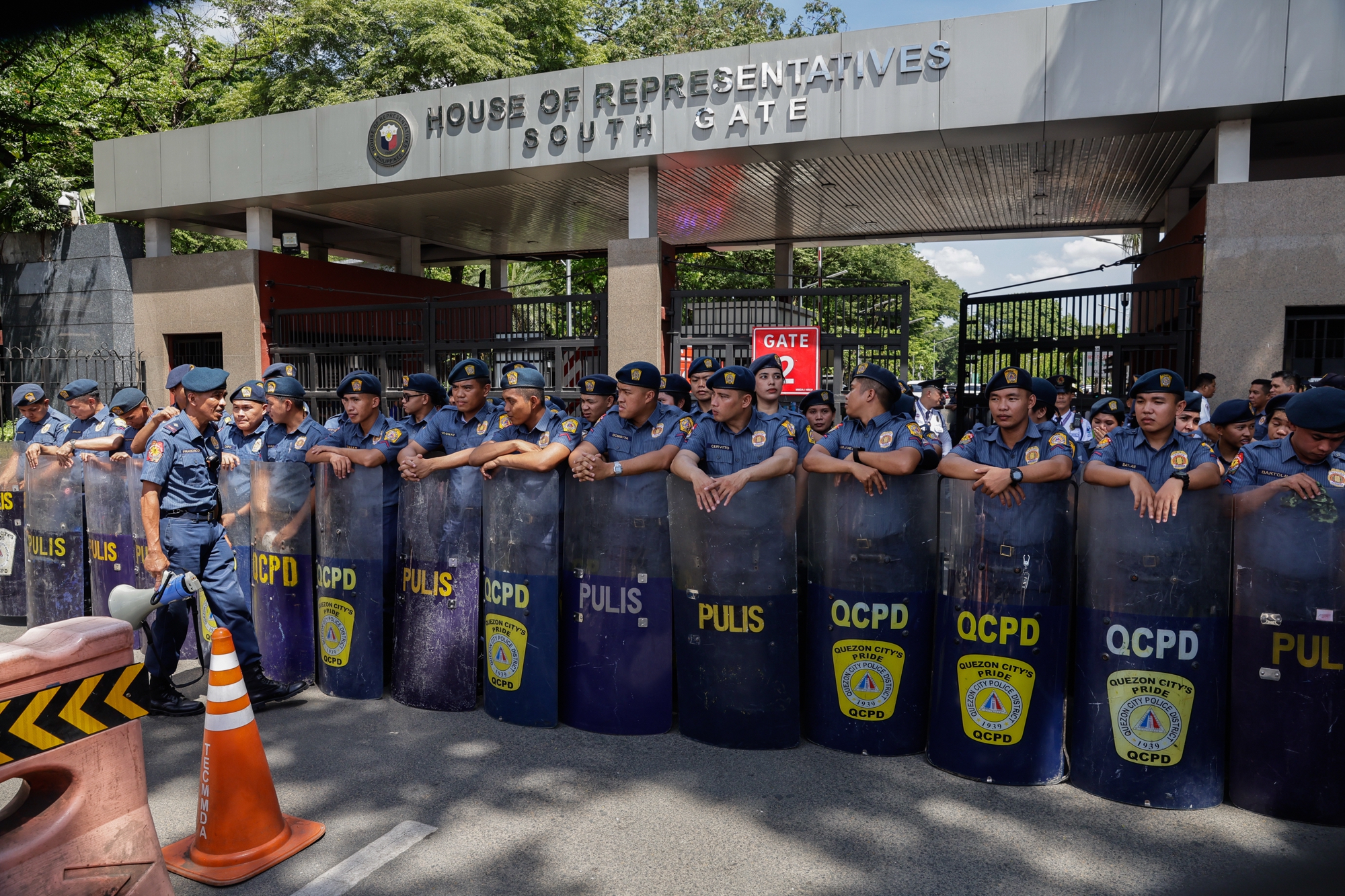 Police stand guard during a rally calling for the impeachment of Philippine Vice-President Sara Duterte, outside the House of Representatives (HOR) in Quezon City, Metro Manila, Philippines, 11 May 2026. House legislators are expected to hold a plenary session on 11 May to deliberate on impeachment complaints against Duterte, who is facing corruption charges.  EPA/ROLEX DELA PENA