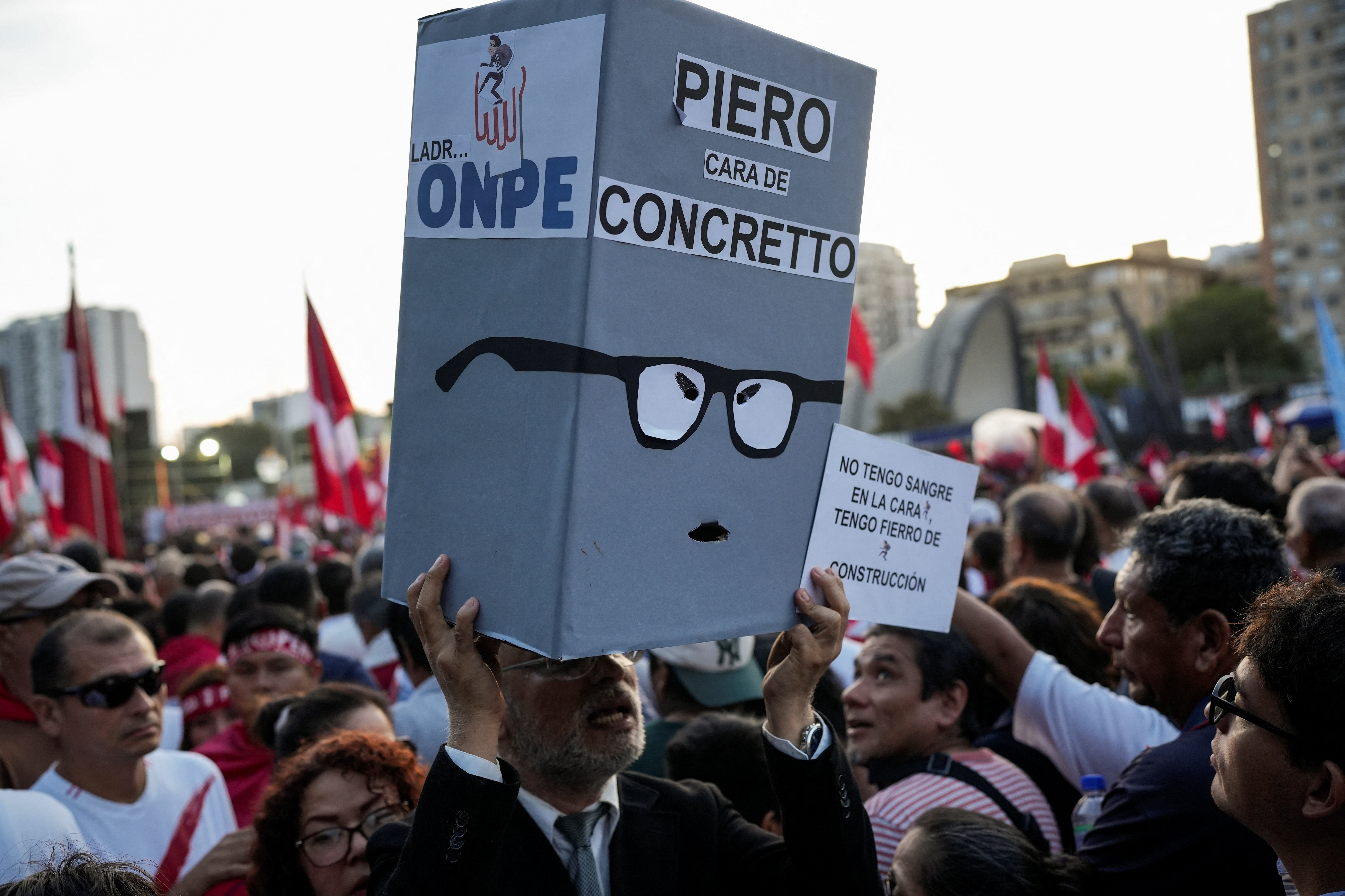 Supporters of presidential candidate Rafael Lopez Aliaga march, in Lima