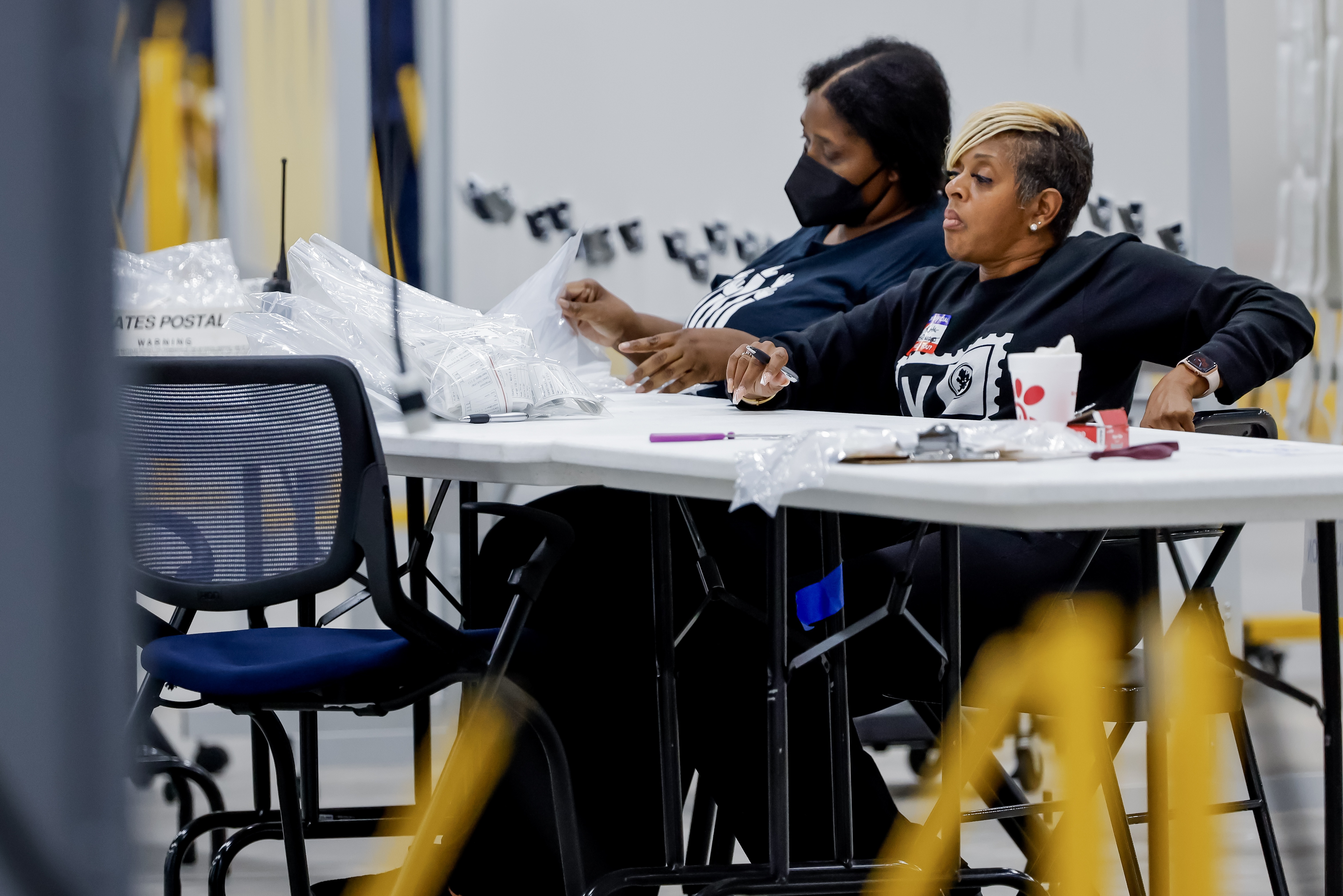 Fulton County Department of Registration & Elections workers tabulate memory cards from Early Voting machines at the county's new Elections Hub and Operations Center in Union City, Georgia, USA, 05 November 2024. Voters across the country are casting ballots today for President of the United States in a tightly contested race between Republican presidential candidate Donald J. Trump and Democratic presidential candidate US Vice President Kamala Harris, as well as for candidates in Senate and Congressional races.  EPA/ERIK S. LESSER