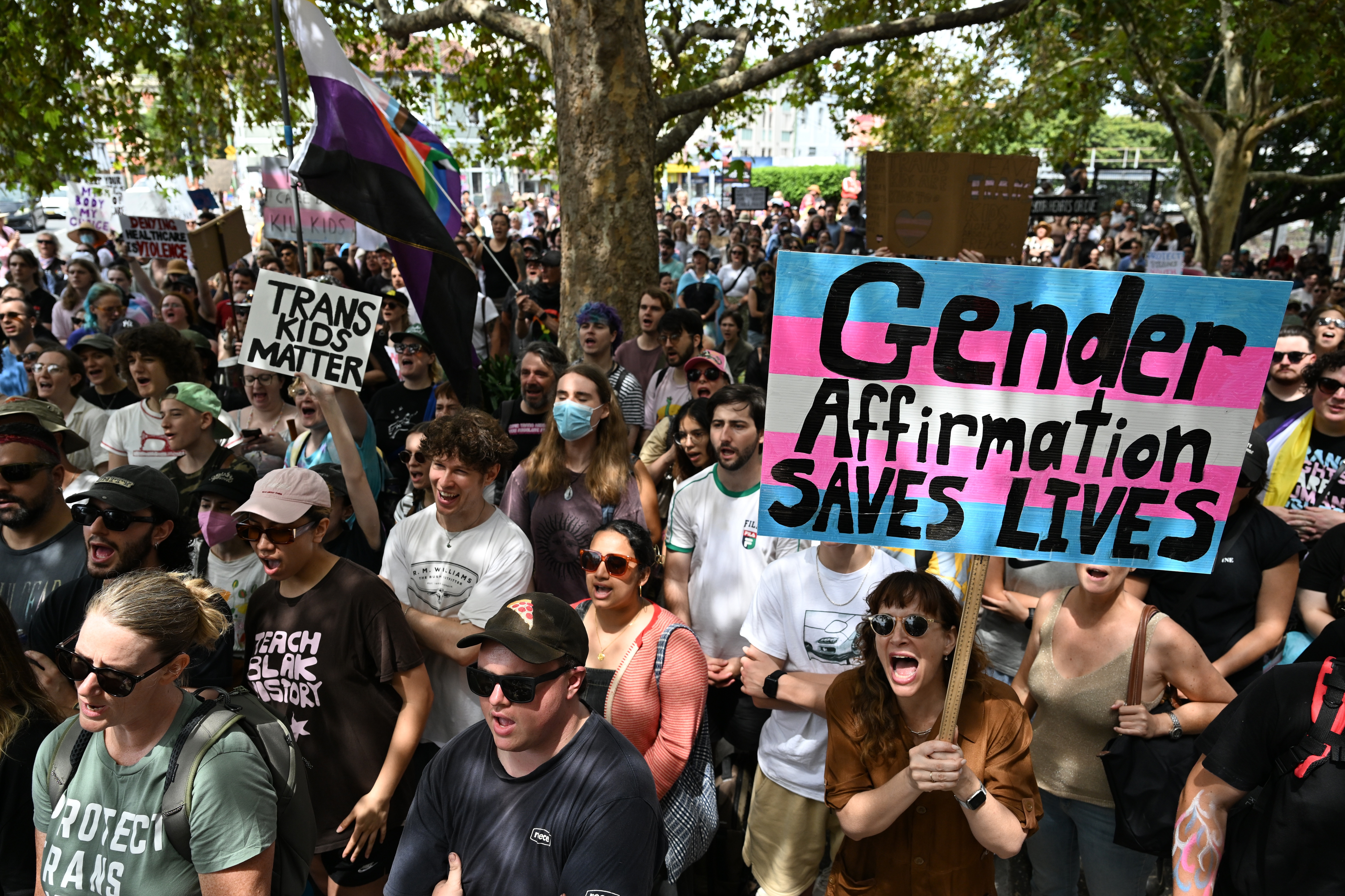 Protesters gather during a rally for the Protect Trans Youth National Day of Action at Pride Square in Newtown, Sydney, Australia, 08 February 2025. Rallies in support of transgender youth are being held nationwide to protest laws that advocates say are a politically motivated attack. EPA/DEAN LEWINS AUSTRALIA AND NEW ZEALAND OUT