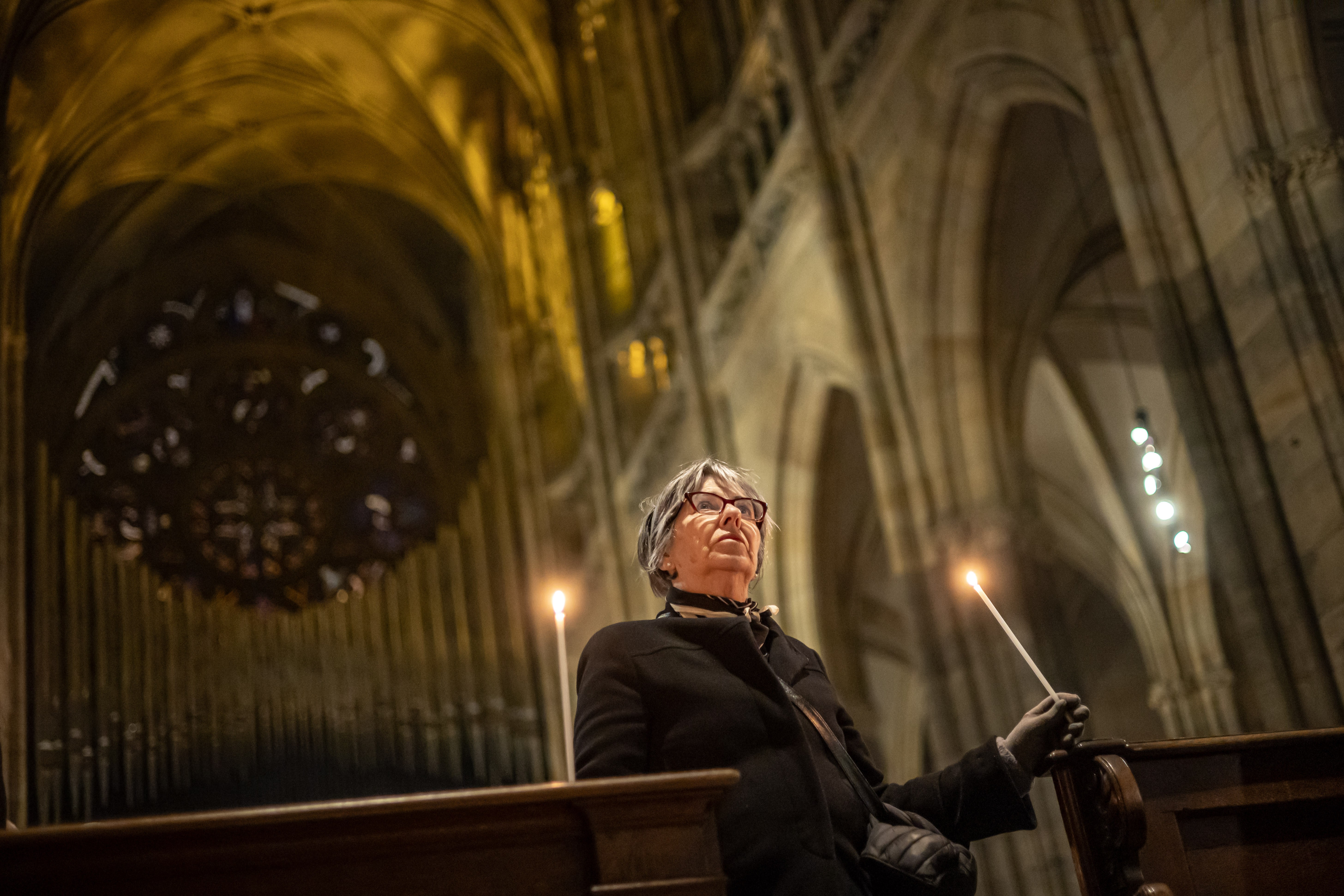 Faithful participates in the Easter vigil mass in St. Vitus Cathedral at Prague Castle, as Christians commemorate the crucifixion of Jesus Christ, in Prague, Czech Republic, 04 April 2026. The Holy Saturday observance commemorates the final day of Christ's death.  EPA/MARTIN DIVISEK