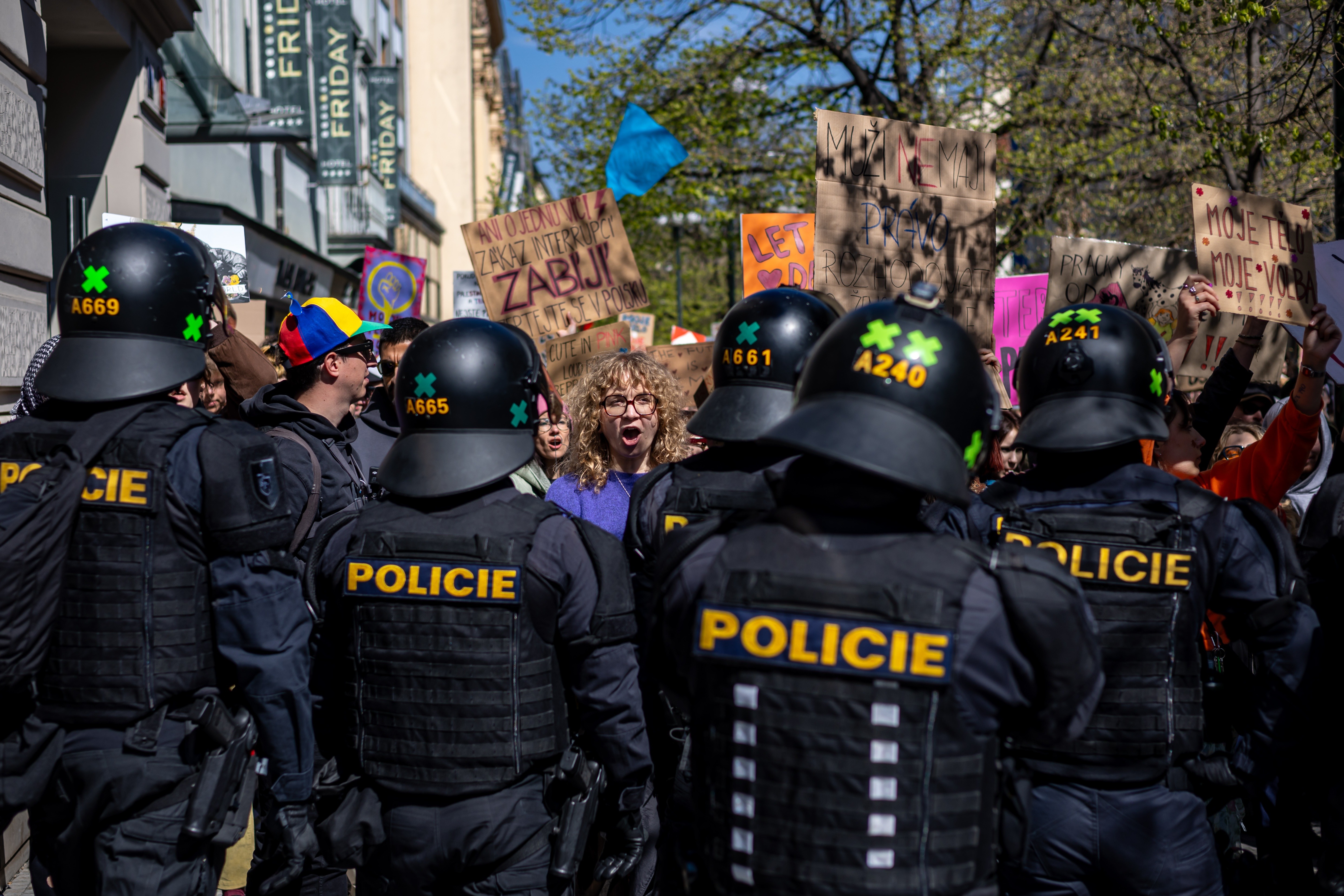 Opponents are blocked by police as they protest against the 'March for Life' demonstration in Prague, Czech Republic, 11 April 2026. 'March for Life' is organized by the Movement for Life as support for women facing unplanned pregnancies, though critics argue it questions women's right to decide on abortion. Opponents of the event have repeatedly tried to block the march in central Prague. EPA/MARTIN DIVISEK