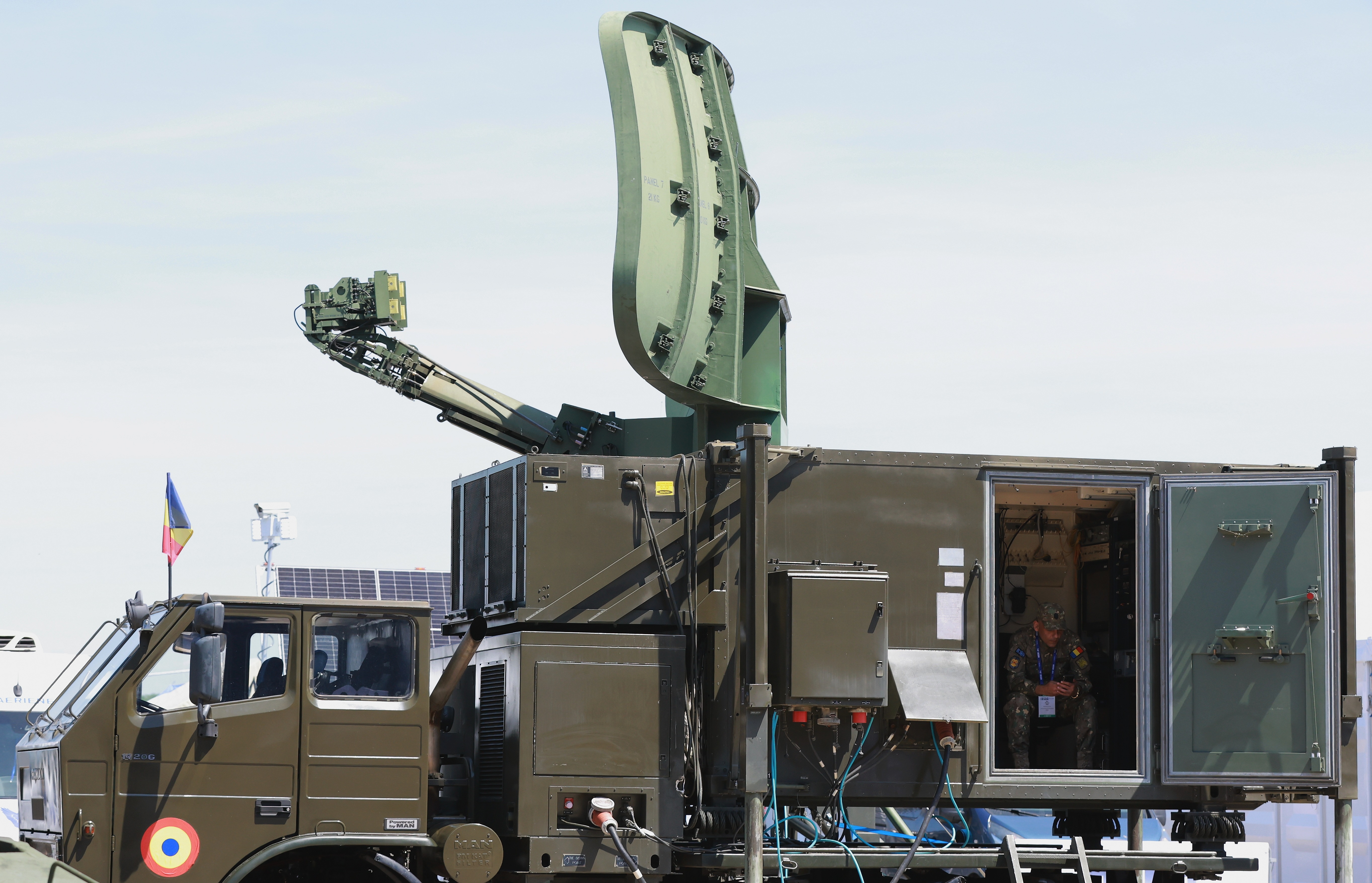 A Romanian soldier (R) guards the radar and control unit of a Romanian Army MIM-104 Patriot surface-to-air missile and air defense system during the final day of the Black Sea Defense and Aerospace Exhibition 2026 in Bucharest, Romania, 15 May 2026. More than 550 defense, security and aerospace companies from 36 countries presented products and equipment at the 10th edition of BSDA, which marked 20 years since the event’s launch. EPA/ROBERT GHEMENT