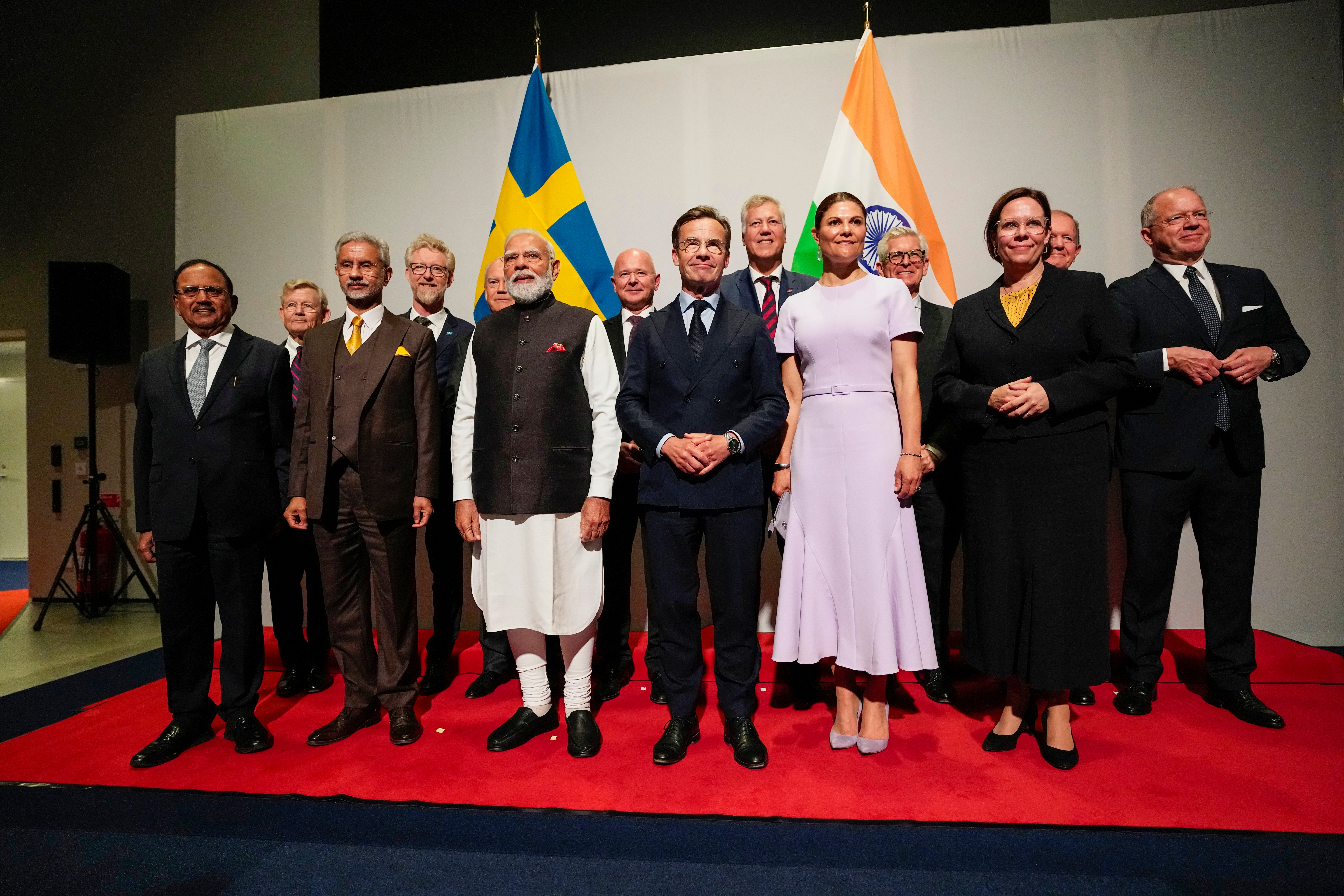 Indian Prime Minister Narendra Modi (3-L, front), Swedish Prime Minister Ulf Kristerson (C), Crown Princess Victoria and Foreign Minister Maria Malmser Stenergard pose for a group photo along with, among others, Jacob Wallenberg, Borje Ekholm and Martin Lundstet, at World of Volvo where the leaders will hold bilateral meetings and participate in discussions with European business leaders on innovation and trade, in Gothenburg, Sweden, 17 May 2026. EPA/BJORN LARSSON ROSVALL SWEDEN OUT