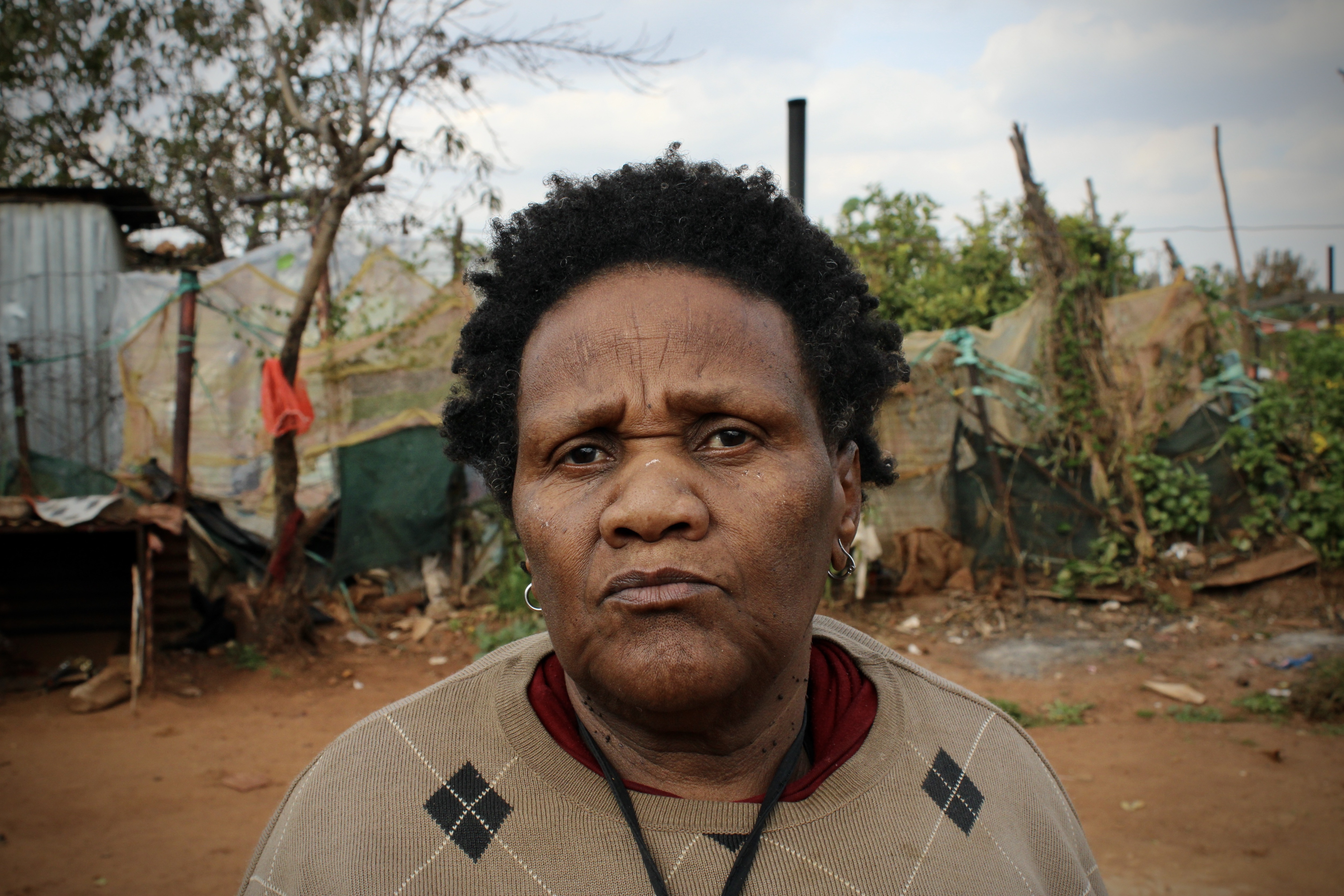 Nonkululeko Gwaza (65) has lived in Snake Park, Soweto, for 26 years with no electricity or running water. (Photo: Lillian Roberts) 