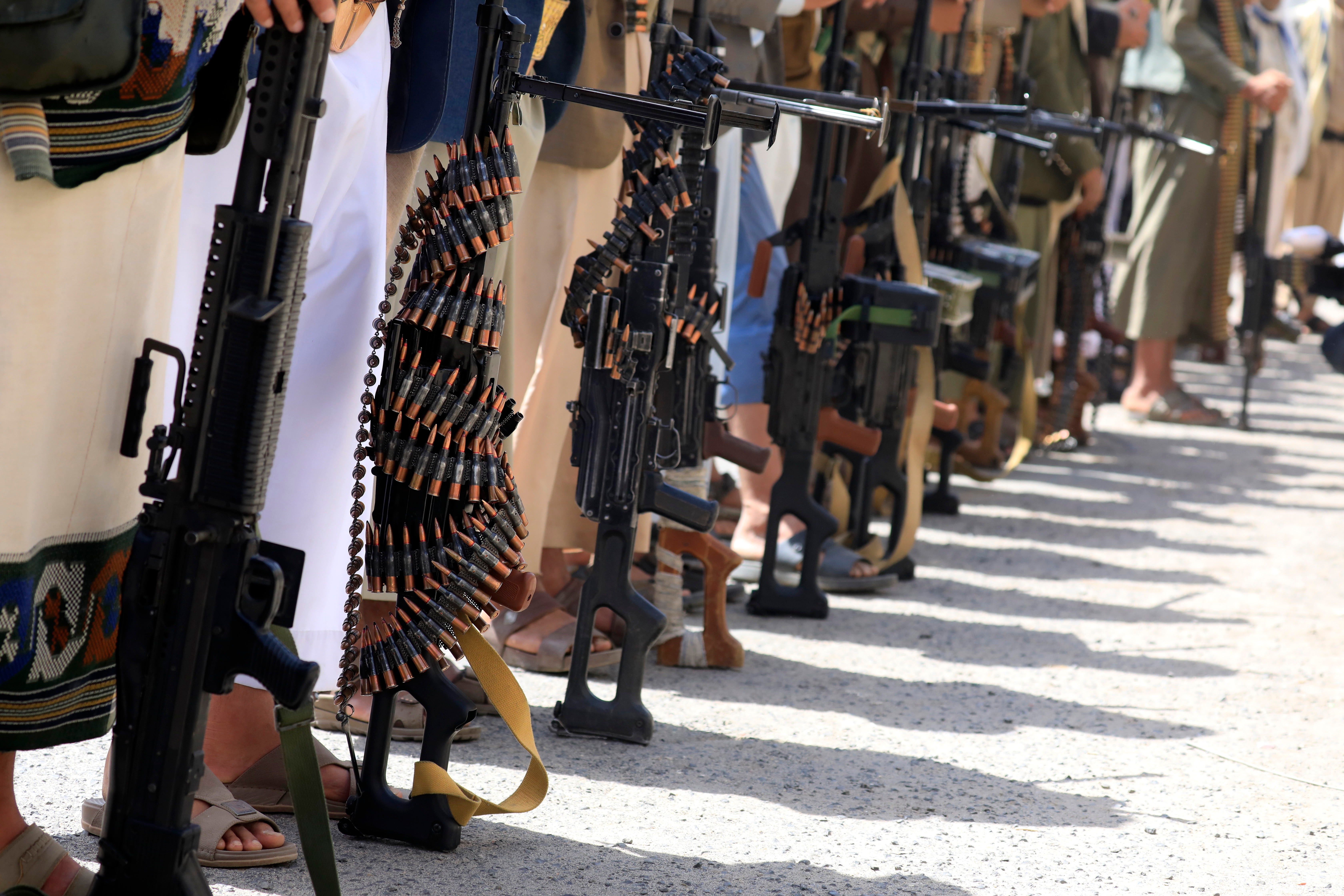 Armed tribesmen hold machine guns during an anti-US and anti-Israel gathering mobilizing more fighters, in Sana'a, Yemen, 06 April 2026. Yemen's Houthis have been recruiting more fighters as part of a mobilization campaign in anticipation of a possible confrontation with the United States and Israel amid current regional tensions. The Houthis have launched missile-drone attacks against Israel in support of Iran and its allied groups in the Middle East. EPA/YAHYA ARHAB