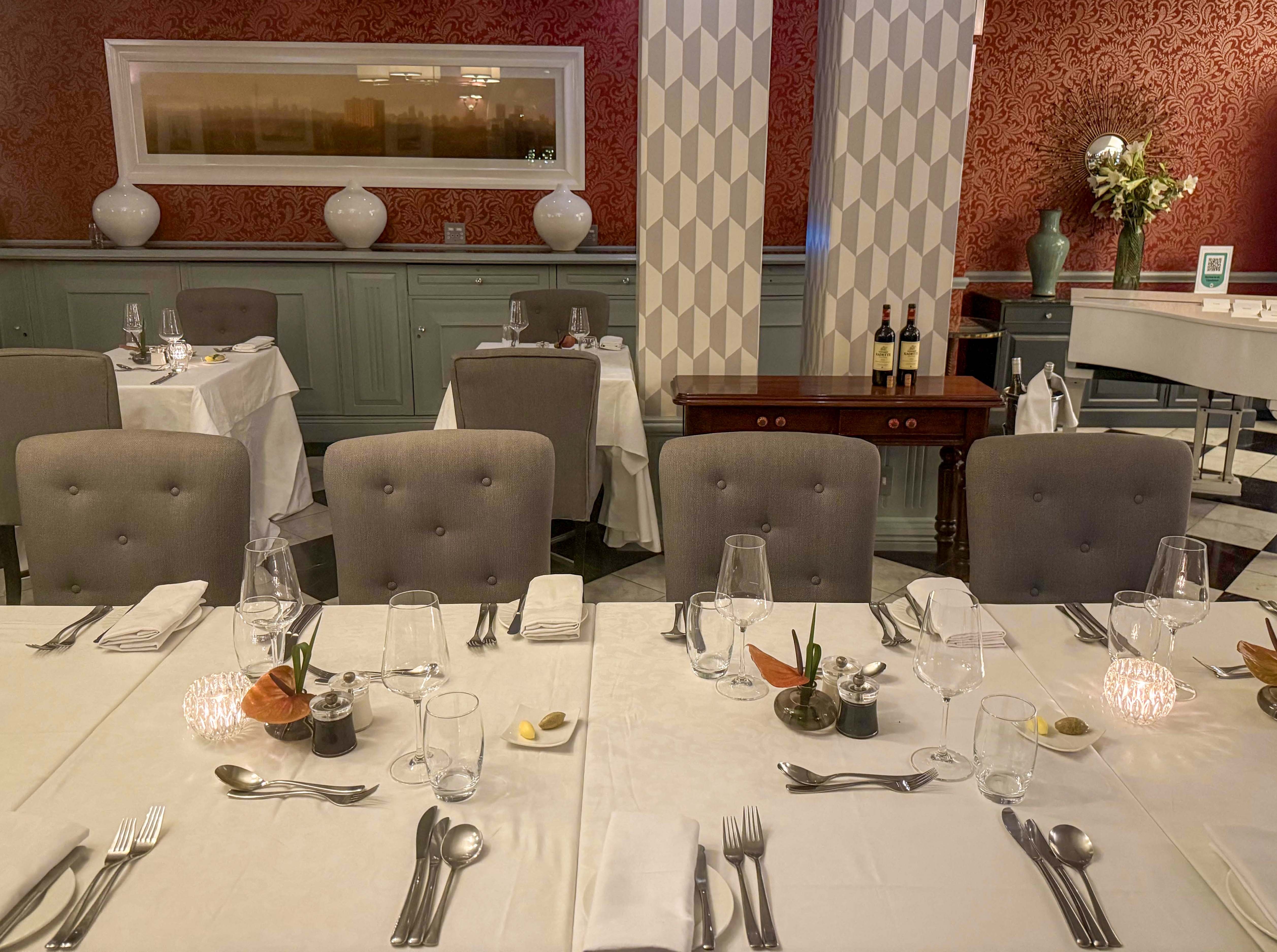 A long table is set for a group of French tourists at Level Four restaurant. (Photo: Tony Jackman)